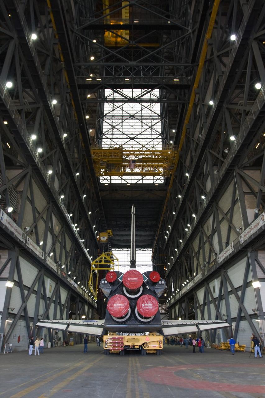 CAPE CANAVERAL, Fla. – At NASA's Kennedy Space Center in Florida, space shuttle Endeavour arrives in the Vehicle Assembly Building transfer aisle. The rollover began at 12:53 a.m. EST and was completed at 2:08 p.m. when Endeavour was towed into the VAB's transfer aisle. Next, Endeavour will be attached to a lifting sling, hoisted over a transom and lowered into High Bay 1, where it will be attached to its external fuel tank and solid rocket boosters. Rollout of the shuttle stack to Kennedy’s Launch Pad 39A, a significant milestone in launch processing activities, is planned for early January 2010. The Italian-built Tranquility module, the primary payload for Endeavour's STS-130 mission, will be installed in the payload bay after the shuttle arrives at the pad. Launch is targeted for early February. For information on the STS-130 mission and crew, visit http://www.nasa.gov/mission_pages/shuttle/shuttlemissions/sts130/index.html. Photo credit: NASA/Dimitri Gerondidakis