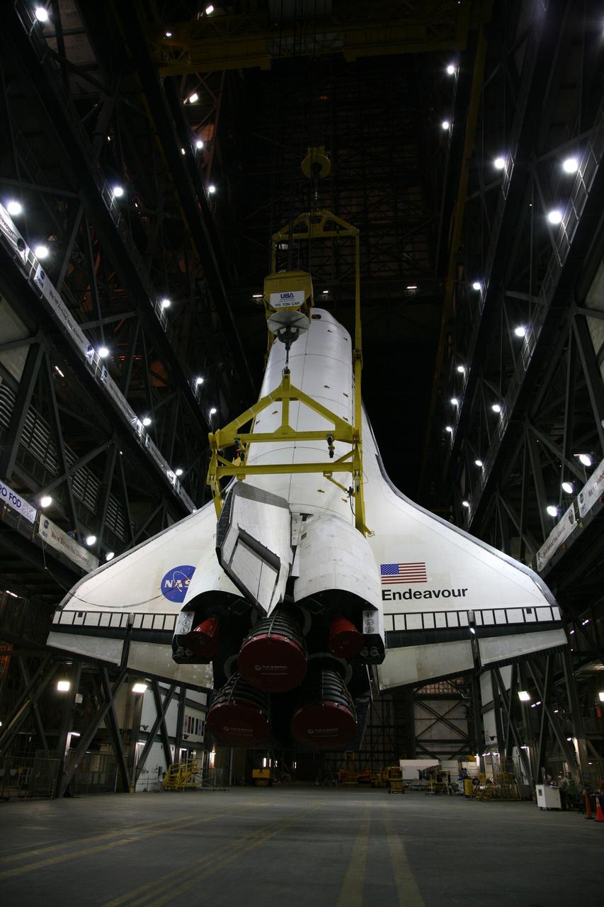 CAPE CANAVERAL, Fla. – In the transfer aisle of the Vehicle Assembly Building at NASA's Kennedy Space Center in Florida, space shuttle Endeavour is rotated into a vertical position with the aid of a lifting sling. Next, Endeavour will be hoisted over a transom and lowered into High Bay 1, where it will be attached to its external fuel tank and solid rocket boosters. Rollout of the shuttle stack to Kennedy’s Launch Pad 39A, a significant milestone in launch processing activities, is planned for early January 2010. The Italian-built Tranquility module, the primary payload for Endeavour's STS-130 mission, will be installed in the payload bay after the shuttle arrives at the pad. Launch is targeted for early February. For information on the STS-130 mission and crew, visit http://www.nasa.gov/mission_pages/shuttle/shuttlemissions/sts130/index.html. Photo credit: NASA/Dimitri Gerondidakis
