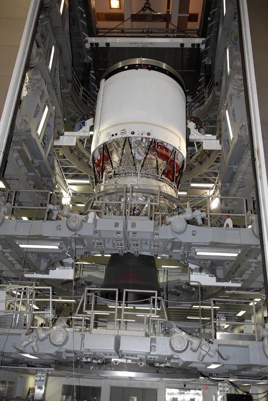 CAPE CANAVERAL, Fla. – Nozzle extension deployment system testing on the second stage of a Delta IV rocket has been completed in a test cell in the hangar of the Delta Operations Center at Cape Canaveral Air Force Station in Florida. The United Launch Alliance Delta IV rocket is slated to launch GOES-P, the latest Geostationary Operational Environmental Satellite developed by NASA for the National Oceanic and Atmospheric Administration, or NOAA. Next, the second stage will be transported to the Horizontal Integration Facility where it will be inspected and prepared for mating with the Delta IV rocket's first stage. GOES-P, a meteorological satellite, is designed to watch for storm development and observed current weather conditions on Earth. Launch of GOES-P is scheduled for no earlier than Feb. 25, 2010, from Launch Complex 37. For information on GOES-P, visit http://goespoes.gsfc.nasa.gov/goes/spacecraft/n_p_spacecraft.html. Photo credit: NASA/Glenn Benson