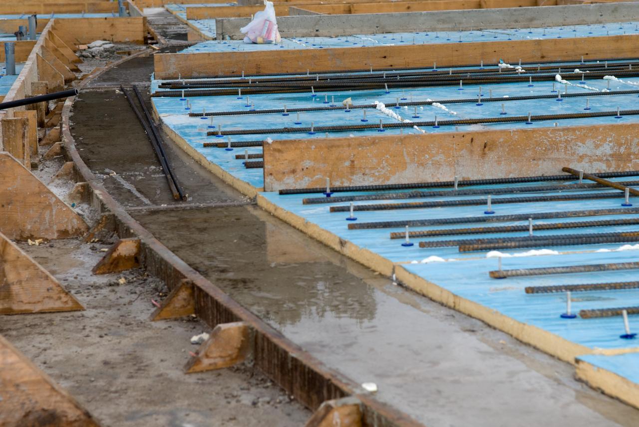 CAPE CANAVERAL, Fla. - Trenches are prepared to support the walls of the Propellants North Administrative and Maintenance Facility in Launch Complex 39 at NASA's Kennedy Space Center in Florida.    The facility will have a two-story administrative building to house managers, mechanics and technicians who fuel spacecraft at Kennedy adjacent to an 1,800-square-foot single-story shop to store cryogenic fuel transfer equipment.  The new facility will feature high-efficiency roofs and walls, “Cool Dry Quiet” air conditioning with energy recovery technology, efficient lighting, and other sustainable features. The facility is striving to qualify for the U.S. Green Building Council’s Leadership in Energy and Environmental Design, or LEED, Platinum certification. If successful, Propellants North will be the first Kennedy facility to achieve this highest of LEED ratings after it is completed in the summer of 2010.  The facility was designed for NASA by Jones Edmunds and Associates.  Photo credit: NASA/Jim Grossmann