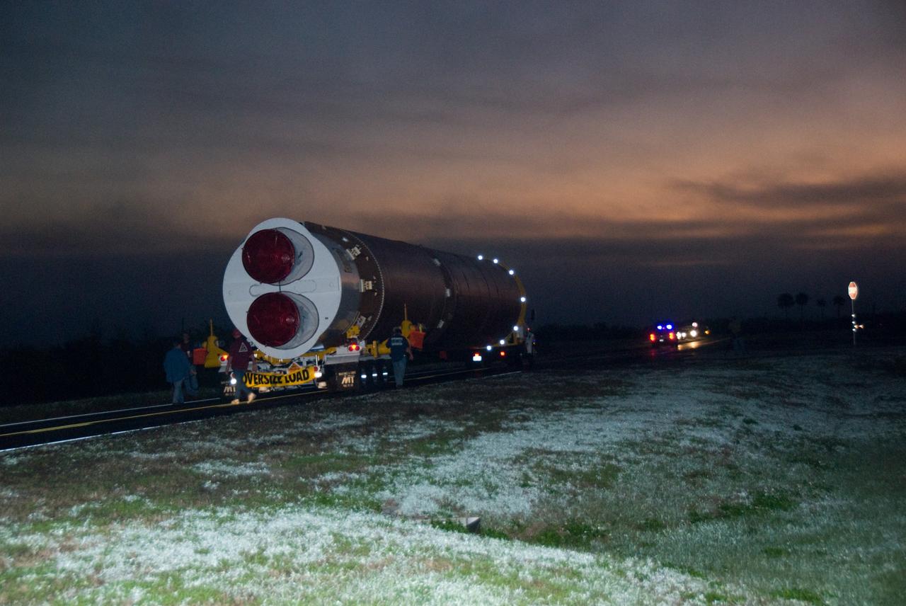 CAPE CANAVERAL, Fla. – The Atlas V rocket scheduled to launch NASA's Solar Dynamics Observatory, or SDO, makes its slow trek from the Atlas Spaceflight Operations Center to Pad 41 on Cape Canaveral Air Force Station in Florida.    SDO is the first space weather research network mission in NASA's Living With a Star Program. The spacecraft's long-term measurements will give solar scientists in-depth information about changes in the sun's magnetic field and insight into how they affect Earth. Liftoff on the United Launch Alliance Atlas V is scheduled for Feb. 3, 2010. For information on SDO, visit http://www.nasa.gov/sdo.  Photo credit: NASA/Glenn Benson