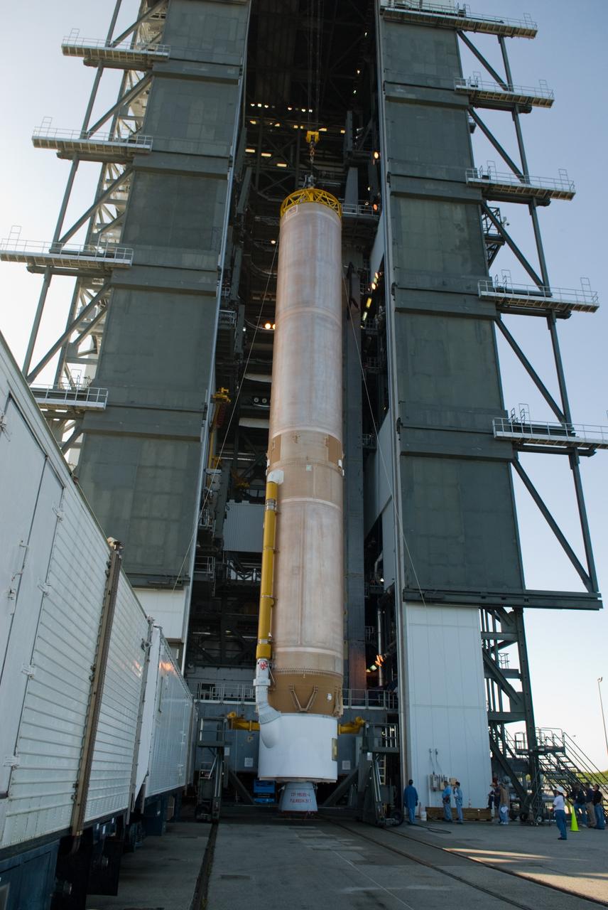 CAPE CANAVERAL, Fla. – The Atlas V rocket scheduled to launch NASA's Solar Dynamics Observatory, or SDO, begins its lift into the Vertical Integration Facility at Launch Complex 41 on Cape Canaveral Air Force Station in Florida.    SDO is the first space weather research network mission in NASA's Living With a Star Program. The spacecraft's long-term measurements will give solar scientists in-depth information about changes in the sun's magnetic field and insight into how they affect Earth. Liftoff on the United Launch Alliance Atlas V is scheduled for Feb. 3, 2010. For information on SDO, visit http://www.nasa.gov/sdo.  Photo credit: NASA/Glenn Benson