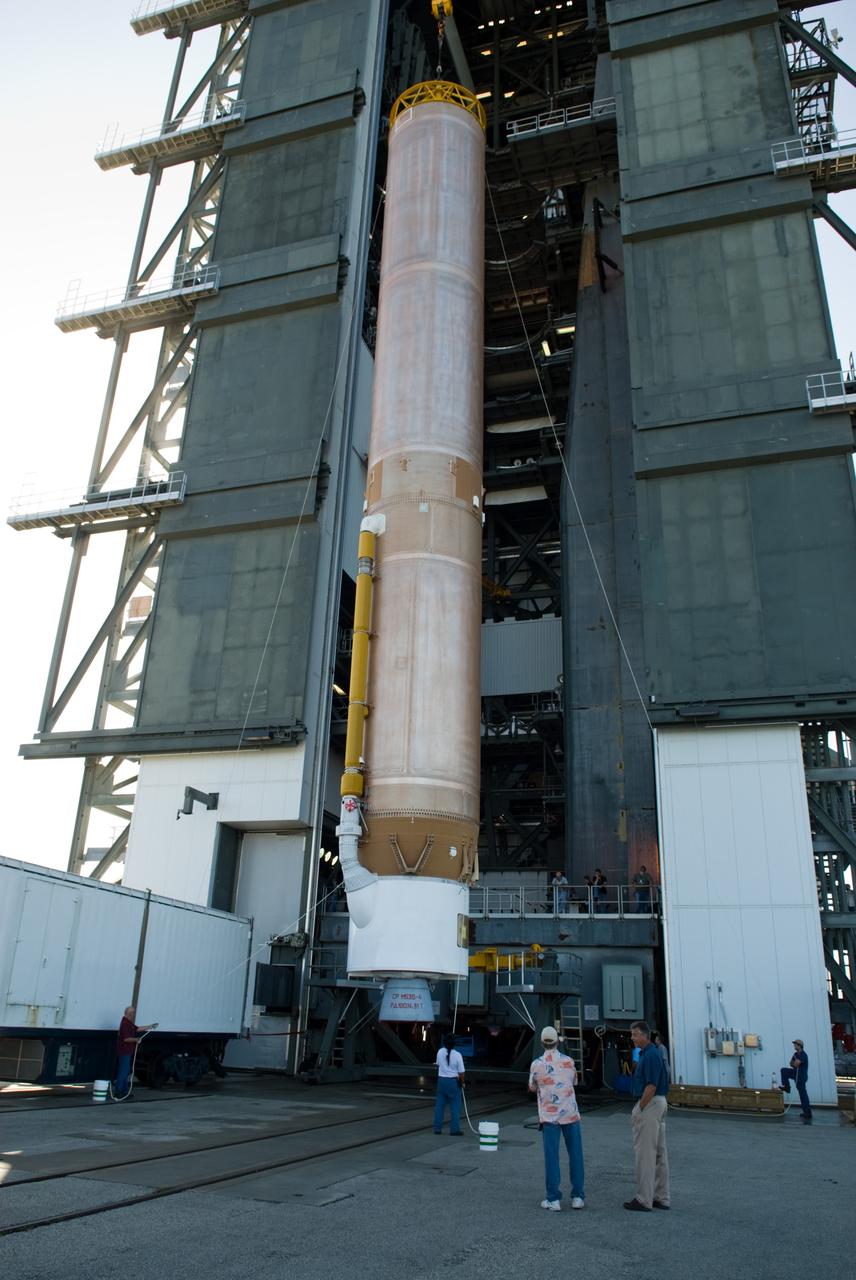 CAPE CANAVERAL, Fla. – Workers hoist the Atlas V rocket scheduled to launch NASA's Solar Dynamics Observatory, or SDO, into the Vertical Integration Facility at Launch Complex 41 on Cape Canaveral Air Force Station in Florida.    SDO is the first space weather research network mission in NASA's Living With a Star Program. The spacecraft's long-term measurements will give solar scientists in-depth information about changes in the sun's magnetic field and insight into how they affect Earth. Liftoff on the United Launch Alliance Atlas V is scheduled for Feb. 3, 2010. For information on SDO, visit http://www.nasa.gov/sdo.  Photo credit: NASA/Glenn Benson