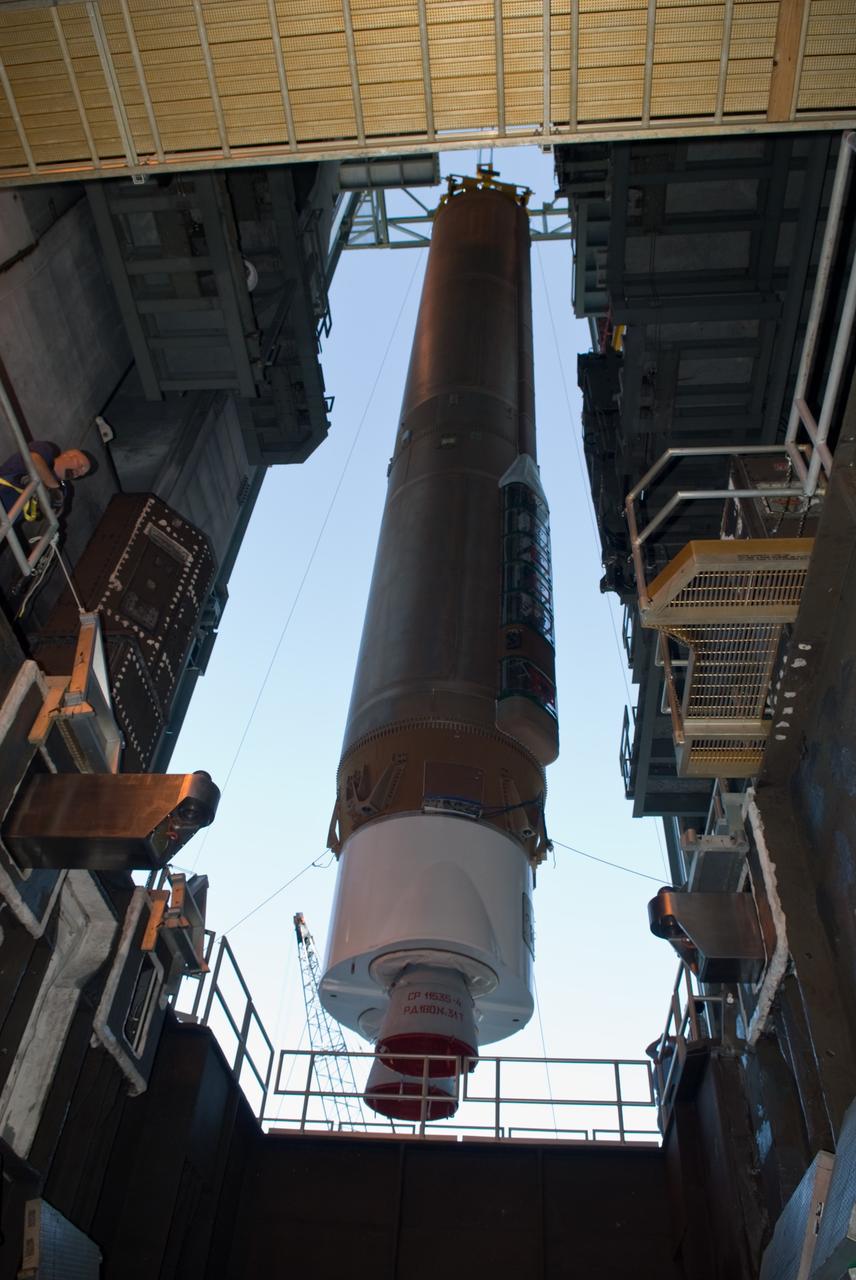 CAPE CANAVERAL, Fla. – The Atlas V rocket scheduled to launch NASA's Solar Dynamics Observatory, or SDO, is slowly maneuvered into position in the Vertical Integration Facility at Launch Complex 41 on Cape Canaveral Air Force Station in Florida.    SDO is the first space weather research network mission in NASA's Living With a Star Program. The spacecraft's long-term measurements will give solar scientists in-depth information about changes in the sun's magnetic field and insight into how they affect Earth. Liftoff on the United Launch Alliance Atlas V is scheduled for Feb. 3, 2010. For information on SDO, visit http://www.nasa.gov/sdo.  Photo credit: NASA/Glenn Benson