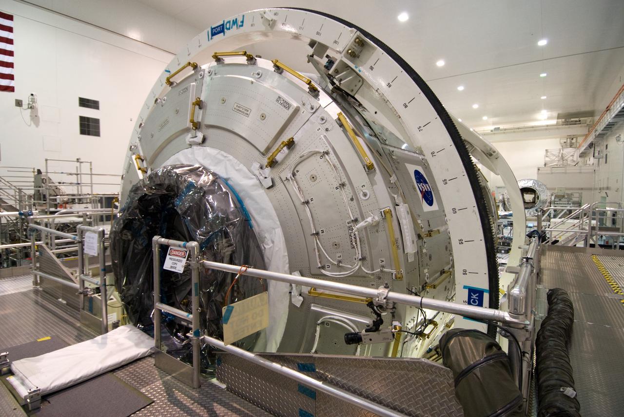 CAPE CANAVERAL, Fla. – In the Space Station Processing Facility at NASA's Kennedy Space Center in Florida, work to secure the hatch on the International Space Station's Node 3, named Tranquility, is complete.     Hatch closure follows the completion of preparations for the node's transport to the pad and is a significant milestone in launch processing activities. The primary payload for the STS-130 mission, Tranquility is a pressurized module that will provide room for many of the space station's life support systems. Attached to one end of Tranquility is a cupola, a unique work area with six windows on its sides and one on top.  The cupola resembles a circular bay window and will provide a vastly improved view of the station's exterior. The multi-directional view will allow the crew to monitor spacewalks and docking operations, as well as provide a spectacular view of Earth and other celestial objects. The module was built in Turin, Italy, by Thales Alenia Space for the European Space Agency.  Space shuttle Endeavour's STS-130 mission is targeted for launch in early February 2010. For information on the STS-130 mission and crew, visit http://www.nasa.gov/mission_pages/shuttle/shuttlemissions/sts130/index.html.  Photo credit: NASA/Amanda Diller