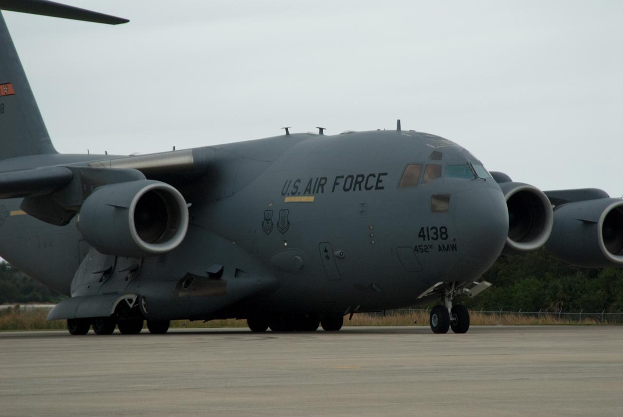 CAPE CANAVERAL, Fla. – NASA's GOES-P meteorological satellite is delivered to the Shuttle Landing Facility at NASA's Kennedy Space Center in Florida aboard a U.S. Air Force C-17 aircraft.    GOES-P, the latest Geostationary Operational Environmental Satellite, was developed by NASA for the National Oceanic and Atmospheric Administration, or NOAA.  GOES-P is designed to watch for storm development and observed current weather conditions on Earth.  Launch of GOES-P is targeted for no earlier than Feb. 25, 2010, from Launch Complex 37 aboard a United Launch Alliance Delta IV rocket.  For information on GOES-P, visit http://goespoes.gsfc.nasa.gov/goes/spacecraft/n_p_spacecraft.html. Photo credit: NASA/Amanda Diller