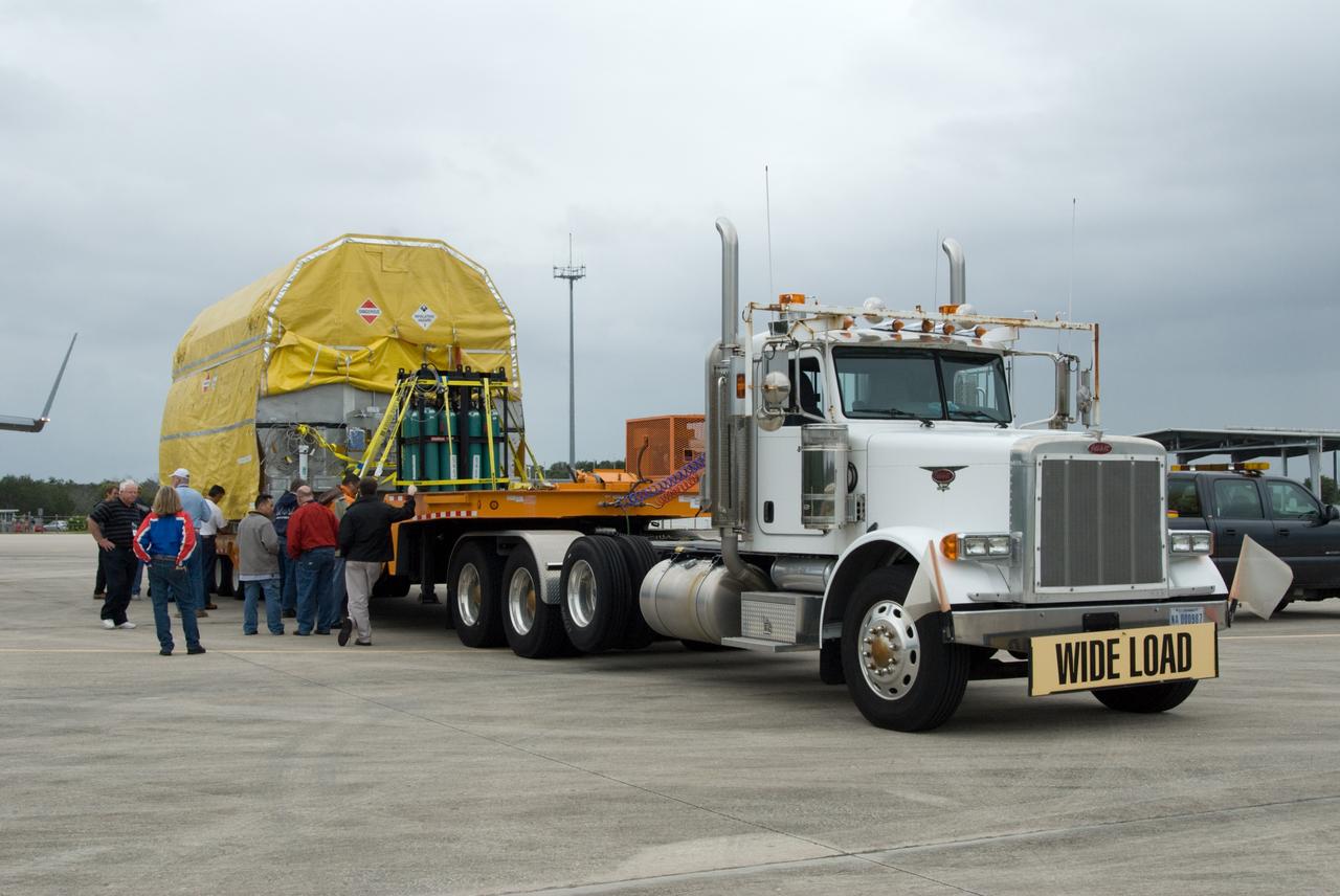CAPE CANAVERAL, Fla. – At the Shuttle Landing Facility at NASA's Kennedy Space Center in Florida, NASA's GOES-P meteorological satellite has been lifted onto a transporter for its move to the Astrotech Space Operations facility in Titusville, Fla., for final processing before launch. GOES-P, the latest Geostationary Operational Environmental Satellite, was developed by NASA for the National Oceanic and Atmospheric Administration, or NOAA. GOES-P is designed to watch for storm development and observed current weather conditions on Earth. Launch of GOES-P is targeted for no earlier than Feb. 25, 2010, from Launch Complex 37 aboard a United Launch Alliance Delta IV rocket. For information on GOES-P, visit http://goespoes.gsfc.nasa.gov/goes/spacecraft/n_p_spacecraft.html. Photo credit: NASA/Amanda Diller