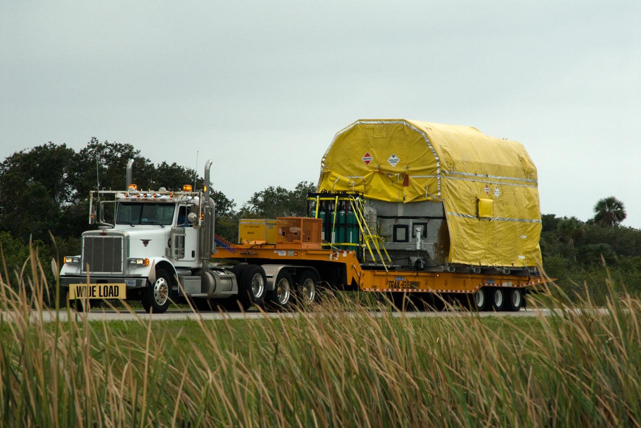 CAPE CANAVERAL, Fla. – At NASA's Kennedy Space Center in Florida, NASA's GOES-P meteorological satellite begins its move to the Astrotech Space Operations facility in Titusville, Fla., for final processing before launch. GOES-P, the latest Geostationary Operational Environmental Satellite, was developed by NASA for the National Oceanic and Atmospheric Administration, or NOAA. GOES-P is designed to watch for storm development and observed current weather conditions on Earth. Launch of GOES-P is targeted for no earlier than Feb. 25, 2010, from Launch Complex 37 aboard a United Launch Alliance Delta IV rocket. For information on GOES-P, visit http://goespoes.gsfc.nasa.gov/goes/spacecraft/n_p_spacecraft.html. Photo credit: NASA/Amanda Diller