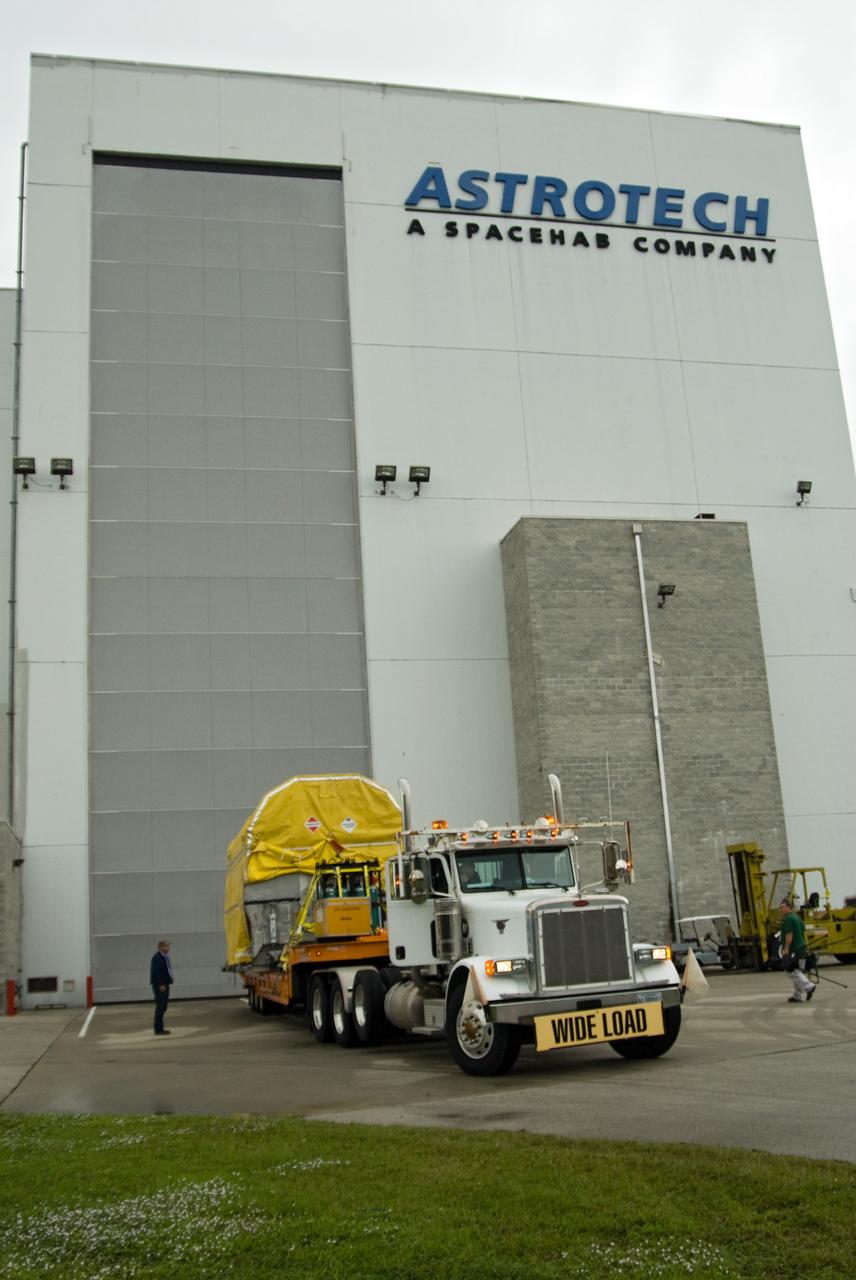 CAPE CANAVERAL, Fla. – At NASA's Kennedy Space Center in Florida, NASA's GOES-P meteorological satellite arrives at the Astrotech Space Operations facility in Titusville, Fla., for final processing before launch.    GOES-P, the latest Geostationary Operational Environmental Satellite, was developed by NASA for the National Oceanic and Atmospheric Administration, or NOAA.  GOES-P is designed to watch for storm development and observed current weather conditions on Earth.  Launch of GOES-P is targeted for no earlier than Feb. 25, 2010, from Launch Complex 37 aboard a United Launch Alliance Delta IV rocket.  For information on GOES-P, visit http://goespoes.gsfc.nasa.gov/goes/spacecraft/n_p_spacecraft.html. Photo credit: NASA/Amanda Diller