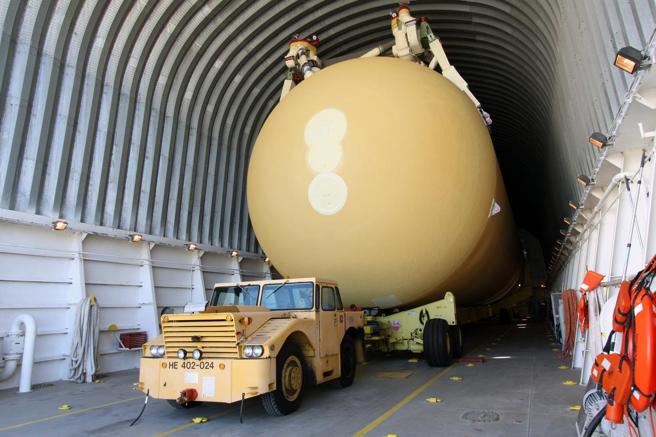 CAPE CANAVERAL, Fla. – At NASA's Kennedy Space Center in Florida, preparations are under way to offload External Tank-135 from the Pegasus barge docked in the turn basin near the Vehicle Assembly Building. Pegasus arrived in Florida on Dec. 26, towed by a solid rocket booster retrieval ship from NASA's Michoud Assembly Facility near New Orleans. ET-135 will be used to launch space shuttle Discovery on the STS-131 mission to the International Space Station. Launch is targeted for March 18. For information on the components of the space shuttle and the STS-131 mission, visit http://www.nasa.gov/mission_pages/shuttle/shuttlemissions/sts131/index.html. Photo credit: NASA/Jack Pfaller
