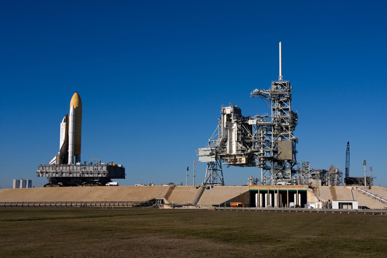 CAPE CANAVERAL, Fla. – At NASA's Kennedy Space Center in Florida, a crawler-transporter keeps space shuttle Endeavour level as it travels up the five percent grade to the fixed service structure on Launch Pad 39A. First motion on the 3.4-mile trip from the Vehicle Assembly Building, known as rollout, was at 4:13 a.m. EST Jan. 6. Endeavour was secure or "hard down" on the pad at 10:37 a.m.    Rollout is a significant milestone in launch processing activities. The primary payload for the STS-130 mission is the International Space Station's Node 3, Tranquility, a pressurized module that will provide room for many of the station's life support systems. Attached to one end of Tranquility is a cupola, a unique work area with six windows on its sides and one on top.  The cupola resembles a circular bay window and will provide a vastly improved view of the station's exterior. The multi-directional view will allow the crew to monitor spacewalks and docking operations, as well as provide a spectacular view of Earth and other celestial objects. The module was built in Turin, Italy, by Thales Alenia Space for the European Space Agency.  Endeavour's STS-130 launch is targeted for 4:39 a.m. EST Feb. 7. For information on the STS-130 mission and crew, visit http://www.nasa.gov/mission_pages/shuttle/shuttlemissions/sts130/index.html.  Photo credit: NASA/Amanda Diller