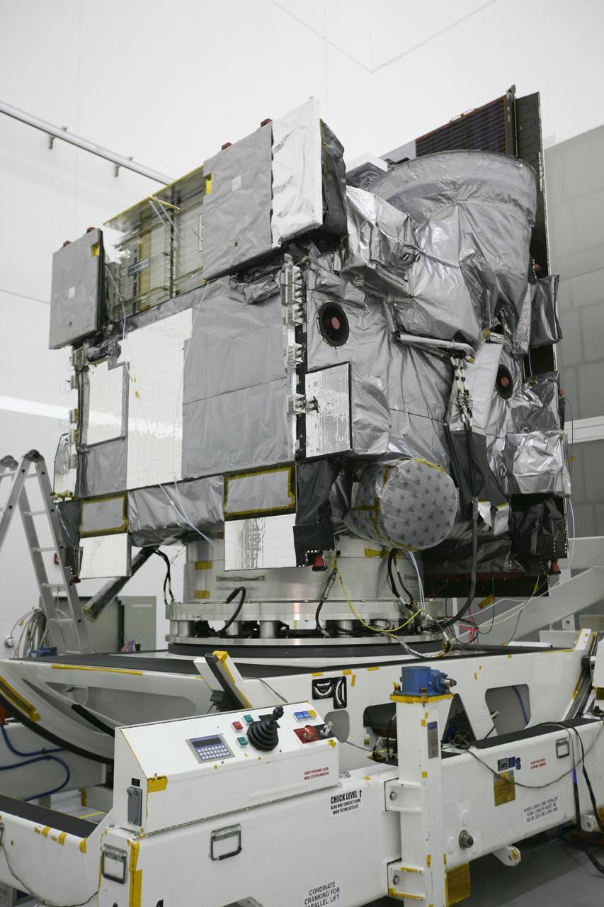 CAPE CANAVERAL, Fla. – At the Astrotech Space Operations facility in Titusville, Fla., the protective wrapping has been removed from NASA's GOES-P meteorological satellite. GOES-P, the latest Geostationary Operational Environmental Satellite, was developed by NASA for the National Oceanic and Atmospheric Administration, or NOAA. GOES-P is designed to watch for storm development and observed current weather conditions on Earth. Launch of GOES-P is targeted for no earlier than March 1 from Launch Complex 37 aboard a United Launch Alliance Delta IV rocket. For information on GOES-P, visit http://goespoes.gsfc.nasa.gov/goes/spacecraft/n_p_spacecraft.html. Photo credit: NASA/Amanda Diller