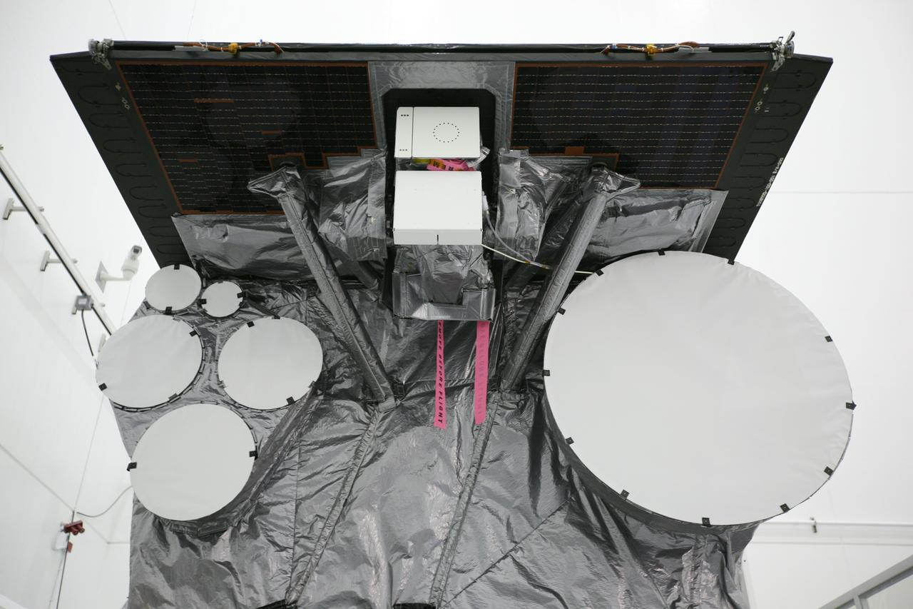 CAPE CANAVERAL, Fla. – At the Astrotech Space Operations facility in Titusville, Fla., the components of NASA's GOES-P meteorological satellite are in view following the spacecraft's unbagging.  The cup-shaped objects on the left side of the spacecraft include the S-band and L-band antennas. The large cup-shaped object at right is the ultrahigh frequency, or UHF, antenna.    GOES-P, the latest Geostationary Operational Environmental Satellite, was developed by NASA for the National Oceanic and Atmospheric Administration, or NOAA.  GOES-P is designed to watch for storm development and observed current weather conditions on Earth.  Launch of GOES-P is targeted for no earlier than March 1 from Launch Complex 37 aboard a United Launch Alliance Delta IV rocket.  For information on GOES-P, visit http://goespoes.gsfc.nasa.gov/goes/spacecraft/n_p_spacecraft.html. Photo credit: NASA/Amanda Diller