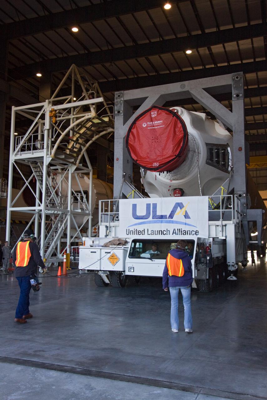 CAPE CANAVERAL, Fla. – In the Horizontal Integration Facility at Launch Complex 37 on Cape Canaveral Air Force Station in Florida, the core stage of a Delta IV rocket begins to roll slowly out of the facility for transfer to the pad. The rocket's core stage is the first stage mated to the second stage. This United Launch Alliance Delta IV rocket is slated to launch GOES-P, the latest Geostationary Operational Environmental Satellite developed by NASA for the National Oceanic and Atmospheric Administration, or NOAA. Launch is targeted for no earlier than March 1. For information on GOES-P, visit http://goespoes.gsfc.nasa.gov/goes/spacecraft/n_p_spacecraft.html. Photo credit: NASA/Jack Pfaller