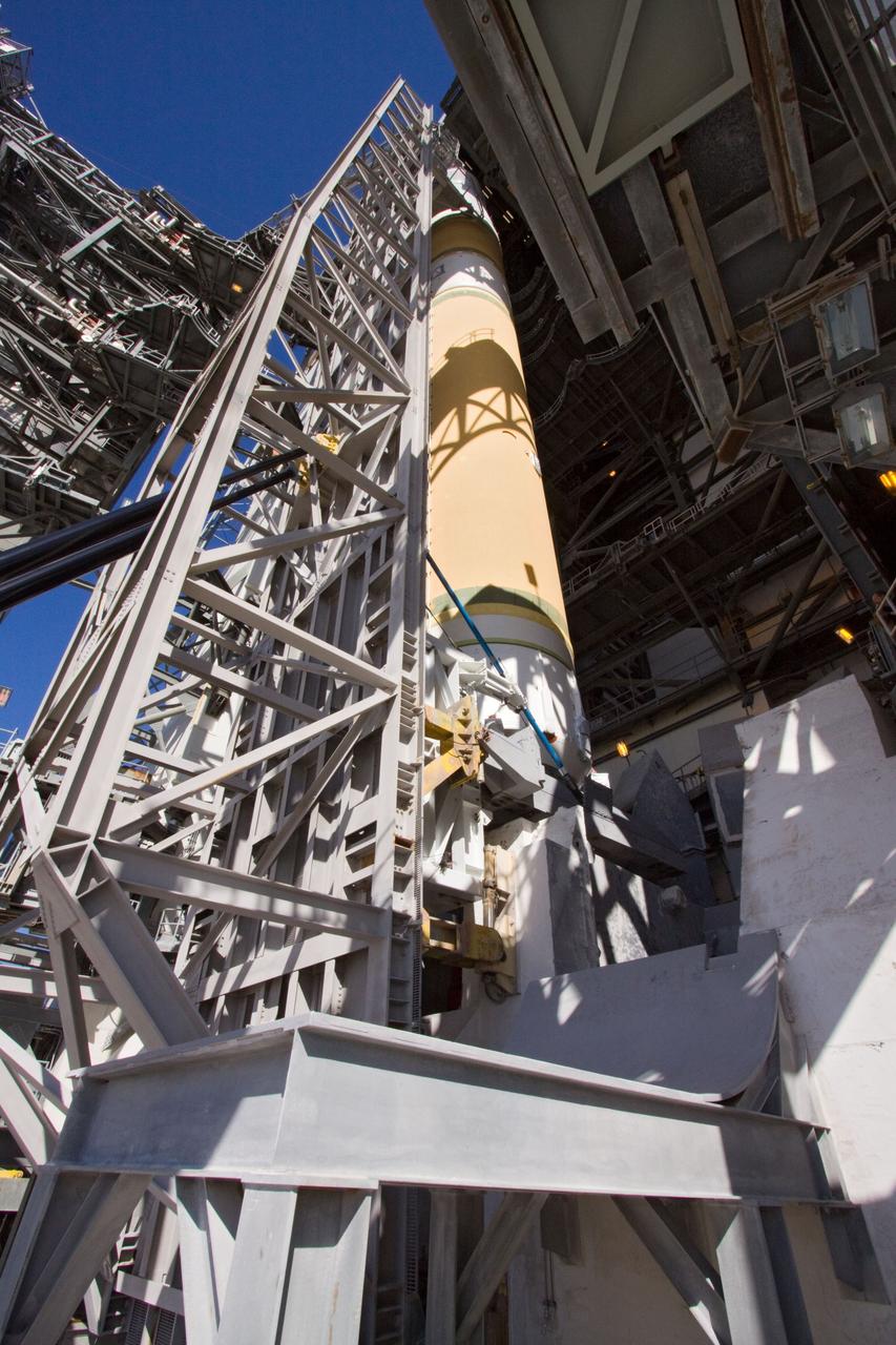 CAPE CANAVERAL, Fla. – At Launch Complex 37 on Cape Canaveral Air Force Station in Florida, the core stage of a Delta IV rocket stands in an upright position and is ready for transfer into the mobile service tower.    The rocket's first stage mated to its second stage comprise the core stage. The rocket is slated to launch GOES-P, the latest Geostationary Operational Environmental Satellite developed by NASA for the National Oceanic and Atmospheric Administration, or NOAA. The Delta IV rocket will be launched by United Launch Alliance for Boeing Launch Services under an FAA commercial license.  Launch is targeted for no earlier than March 1.  For information on GOES-P, visit http://goespoes.gsfc.nasa.gov/goes/spacecraft/n_p_spacecraft.html. Photo credit: NASA/Jack Pfaller