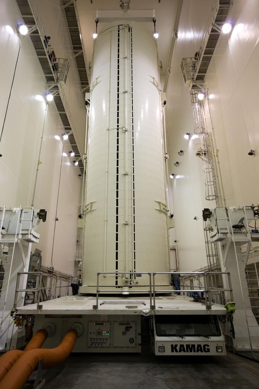 CAPE CANAVERAL, Fla. – In the Space Station Processing Facility at NASA's Kennedy Space Center in Florida, the payload transportation canister containing the International Space Station's Node 3, named Tranquility, is ready for its move to Launch Pad 39A. The primary payload for space shuttle Endeavour's STS-130 mission, Tranquility is a pressurized module that will provide room for many of the space station's life support systems. Attached to one end of Tranquility is a cupola, a unique work area with six windows on its sides and one on top. The cupola resembles a circular bay window and will provide a vastly improved view of the station's exterior. The multi-directional view will allow the crew to monitor spacewalks and docking operations, as well as provide a spectacular view of Earth and other celestial objects. The module was built in Turin, Italy, by Thales Alenia Space for the European Space Agency. Launch of STS-130 is targeted for Feb. 7. For information on the STS-130 mission and crew, visit http://www.nasa.gov/mission_pages/shuttle/shuttlemissions/sts130/index.html. Photo credit: NASA/Dimitri Gerondidakis