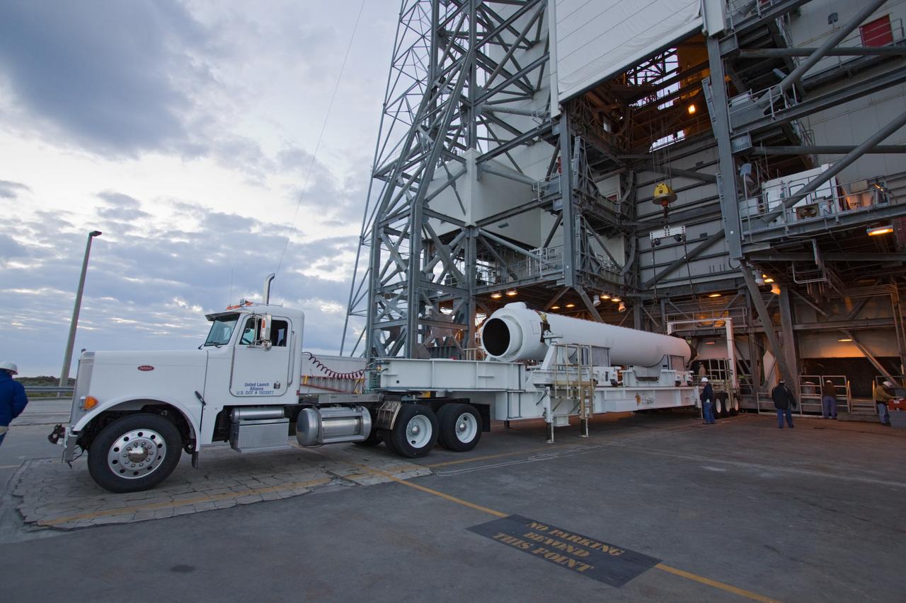 CAPE CANAVERAL, Fla. – At Launch Complex 37 on Cape Canaveral Air Force Station in Florida, a solid rocket booster for the Delta IV rocket slated to launch NASA's GOES-P meteorological satellite is delivered to the mobile service tower.    GOES-P is the latest Geostationary Operational Environmental Satellite developed by NASA for the National Oceanic and Atmospheric Administration, or NOAA. The Delta IV rocket will be launched by United Launch Alliance for Boeing Launch Services under an FAA commercial license.  Launch is targeted for no earlier than March 1.  For information on GOES-P, visit http://goespoes.gsfc.nasa.gov/goes/spacecraft/n_p_spacecraft.html. Photo credit: NASA/Jack Pfaller