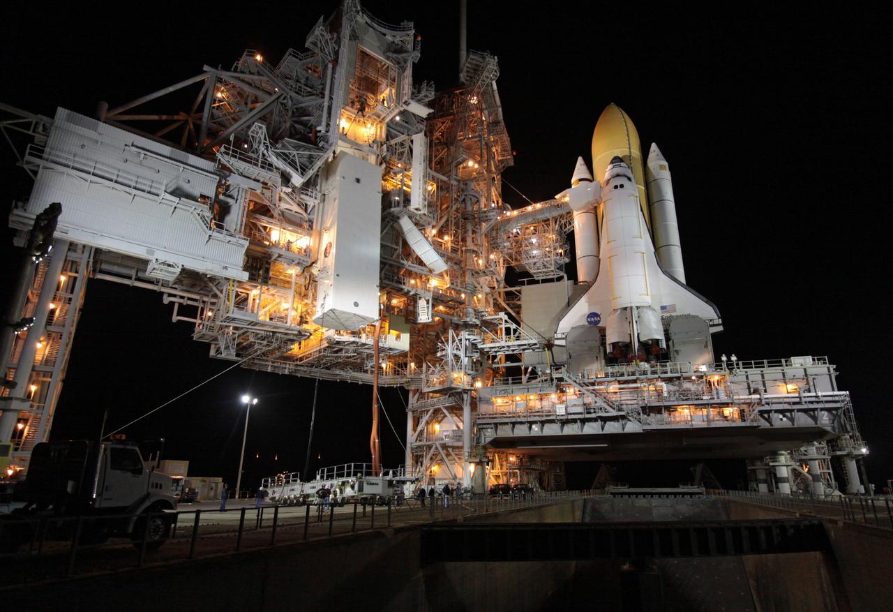 CAPE CANAVERAL, Fla. – At NASA's Kennedy Space Center in Florida, the payload transportation canister containing the International Space Station's Node 3, named Tranquility, is lifted toward the payload changeout room in the fixed service structure on Launch Pad 39A. Operations are under way to install Tranquility in space shuttle Endeavour's payload bay.    The primary payload for Endeavour's STS-130 mission, Tranquility is a pressurized module that will provide room for many of the International Space Station's life support systems. Attached to one end of Tranquility is a cupola, a unique work area with six windows on its sides and one on top.  The cupola resembles a circular bay window and will provide a vastly improved view of the station's exterior. The multi-directional view will allow the crew to monitor spacewalks and docking operations, as well as provide a spectacular view of Earth and other celestial objects. The module was built in Turin, Italy, by Thales Alenia Space for the European Space Agency.  Endeavour's launch is targeted for Feb. 7.  For information on the STS-130 mission and crew, visit http://www.nasa.gov/mission_pages/shuttle/shuttlemissions/sts130/index.html.  Photo credit: NASA/Jack Pfaller