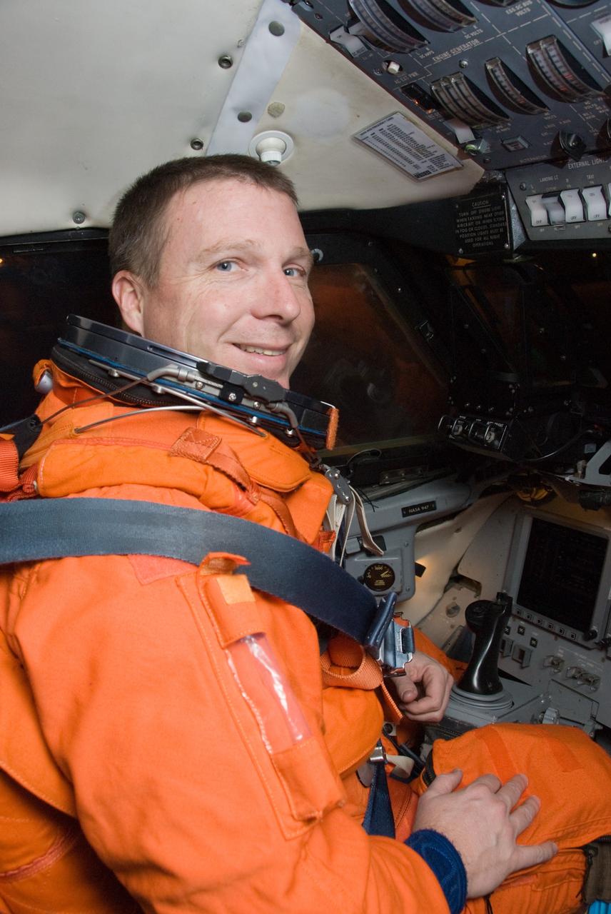 CAPE CANAVERAL, Fla. - At the Shuttle Landing Facility at NASA's Kennedy Space Center in Florida, STS-130 Pilot Terry Virts gets settled in the cockpit of a Shuttle Training Aircraft to practice landings in preparation for space shuttle Endeavour's STS-130 mission. The Shuttle Training Aircraft is a Gulfstream II jet, modified to handle like the space shuttle. The crew members of Endeavour's upcoming mission are at Kennedy for training related to their launch dress rehearsal, the Terminal Countdown Demonstration Test. The primary payload on STS-130 is the International Space Station's Node 3, Tranquility, a pressurized module that will provide room for many of the station's life support systems. Attached to one end of Tranquility is a cupola, a unique work area with six windows on its sides and one on top. Endeavour's launch is targeted for Feb. 7. For information on the STS-130 mission and crew, visit http://www.nasa.gov/mission_pages/shuttle/shuttlemissions/sts130/index.html. Photo credit: NASA/Kim Shiflett