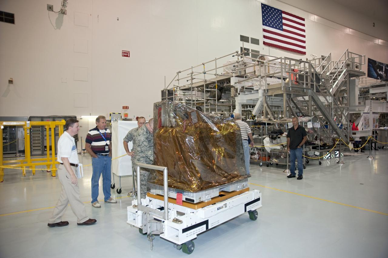 CAPE CANAVERAL, Fla. -- In the Space Station Processing Facility at NASA Kennedy Space Center in Florida, the Space Test Program-Houston-3, or STP-H3, payload is being prepared for installation onto the Express Logistics Carrier-3, or ELC-3.          STP-H3 is a compliment of four individual Department of Defense experiments that will test concepts in low earth orbit for long duration flights. As the final planned mission of the Space Shuttle Program, shuttle Endeavour and its STS-134 crew will deliver the Alpha Magnetic Spectrometer, the ELC-3 as well as critical spare components to the International Space Station. Endeavour is targeted for launch Feb. 26, 2011. For more information visit, http://www.nasa.gov/mission_pages/shuttle/shuttlemissions/sts134/index.html. Photo credit: NASA/Kim Shiflett