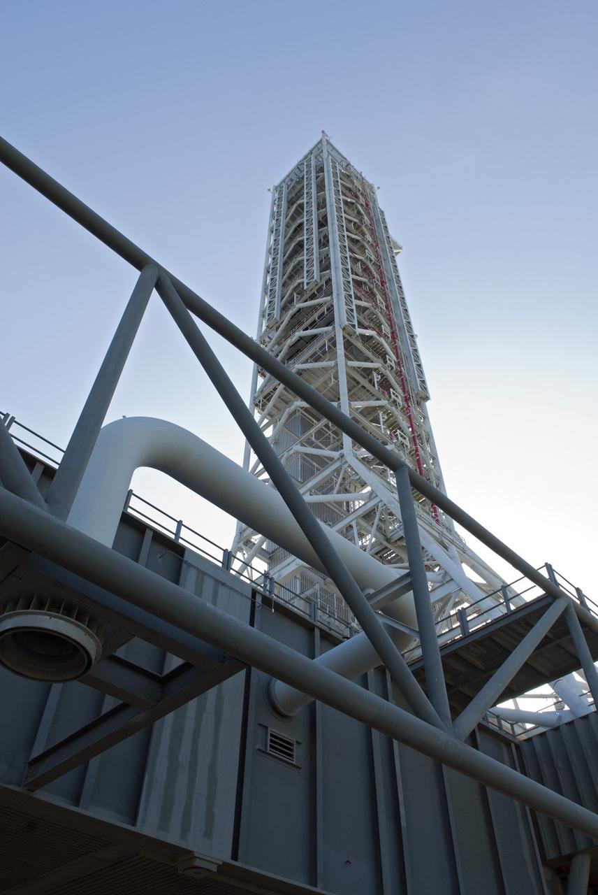 CAPE CANAVERAL, Fla. -- At NASA's Kennedy Space Center in Florida, the tower of NASA's new mobile launcher, or ML, support structure is seen from the structure's base. It took about two years to construct the launcher in the Mobile Launcher Park site, north of the Vehicle Assembly Building, or VAB. The 355-foot-tall structure will support NASA's future human spaceflight program. The base of the launcher is lighter than space shuttle mobile launcher platforms so the crawler-transporter can pick up the heavier load of the tower and a taller rocket. The next step will be to add ground support equipment, such as umbilicals and access arms, for future rocket launches. For information on NASA's future plans, visit www.nasa.gov. Photo credit: NASA/Jim Grossmann