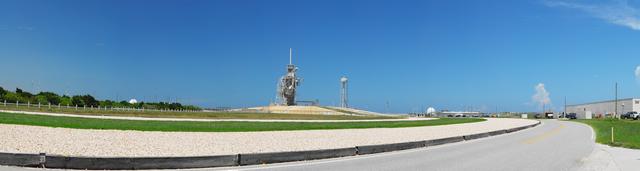 CAPE CANAVERAL, Fla. -- As NASA's Kennedy Space Center in Florida, Launch Pad 39A is seen from the Saturn Causeway. On launch day, space shuttle astronauts ride to their launch pad and spacecraft in NASA's silver Astrovan. Along the way, they pass the Vehicle Assembly Building, Launch Control Center and Press Site.     Adjacent to the road is the crawlerway, which is the route shuttles take to Kennedy's Launch Complex 39 launch pads on top of a crawler-transporter. Photo credit: NASA/Frankie Martin