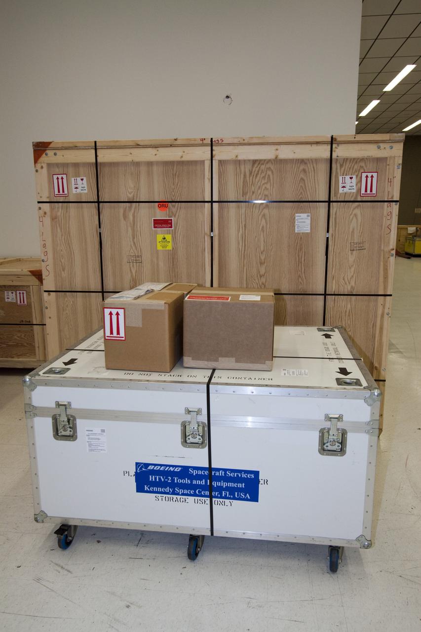 CAPE CANAVERAL, Fla. -- In the Space Station Processing Facility at NASA's Kennedy Space Center in Florida, shipping containers packed with tools and flight support equipment for orbital replacement units are ready for their trip to the Japanese Aerospace Exploration Agency's Tanegashima Space Center. There, the six units, including the flex hose rotary coupler, will be processed for launch to the International Space Station aboard HTV-2, scheduled for Jan. 20, 2011.     HTV-2 is an uncrewed cargo transporter that will be launched by the H-IIB launch vehicle. It is designed to deliver up to 6 tons of supplies, including food, clothes and experiment devices to the space station. Photo credit: NASA/Jack Pfaller