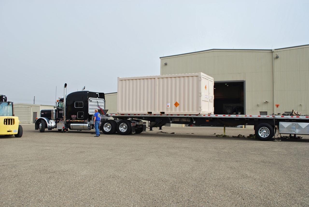 VANDENBERG AIR FORCE BASE, Calif. -- At Vandenberg Air Force Base in California, workers are preparing to unload a payload cone for NASA's Glory mission. The payload cone is an adapter that interfaces the Taurus XL rocket with the spacecraft. A four-stage Taurus XL rocket will carry Glory into low Earth orbit. Once Glory reaches orbit, it will collect data on the properties of aerosols and black carbon. It also will help scientists understand how the sun's irradiance affects Earth's climate. Launch is scheduled for 2:09 a.m. PST Nov. 22. For information, visit www.nasa.gov/glory. Photo credit: NASA/Randy Beaudoin, VAFB
