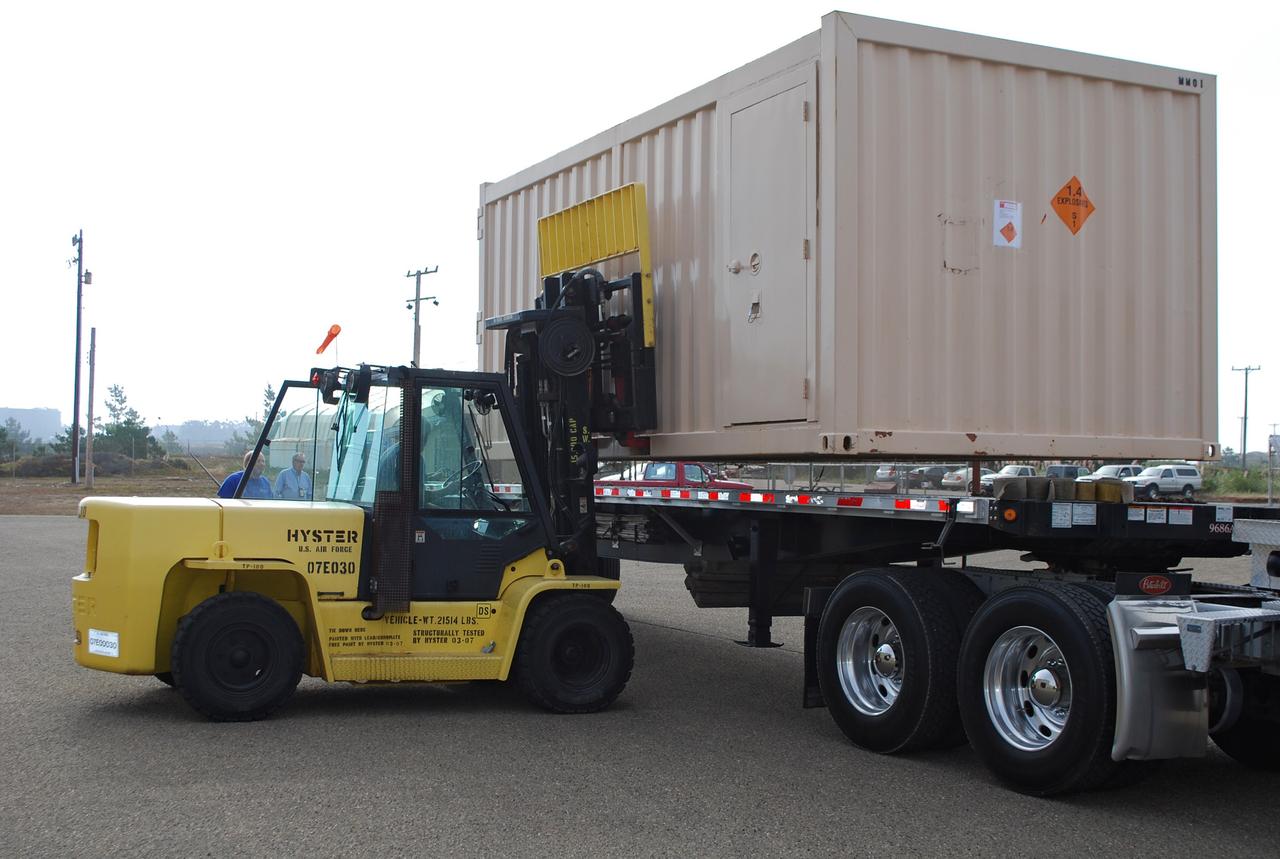 VANDENBERG AIR FORCE BASE, Calif. -- At Vandenberg Air Force Base in California, workers are preparing to unload a payload cone for NASA's Glory mission. The payload cone is an adapter that interfaces the Taurus XL rocket with the spacecraft. A four-stage Taurus XL rocket will carry Glory into low Earth orbit. Once Glory reaches orbit, it will collect data on the properties of aerosols and black carbon. It also will help scientists understand how the sun's irradiance affects Earth's climate. Launch is scheduled for 2:09 a.m. PST Nov. 22. For information, visit www.nasa.gov/glory. Photo credit: NASA/Randy Beaudoin, VAFB