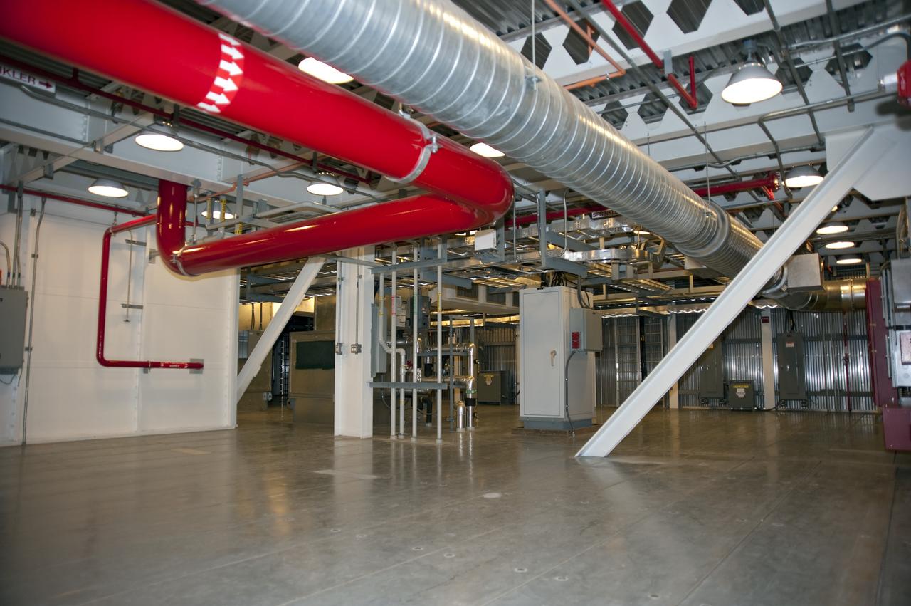 CAPE CANAVERAL, Fla. -- The interior of NASA's new mobile launcher, or ML, support structure is outfitted with solid steel flooring, lights, air conditioning, electrical boxes and sprinkler piping at NASA's Kennedy Space Center in Florida.    The 355-foot-tall structure will support NASA's future human spaceflight program. The base of the launcher is lighter than space shuttle mobile launcher platforms so the crawler-transporter can pick up the heavier load of the tower and a taller rocket. The next step will be to add ground support equipment, such as umbilicals and access arms, for future rocket launches. For information on NASA's future plans, visit www.nasa.gov. Photo credit: NASA/Kim Shiflett