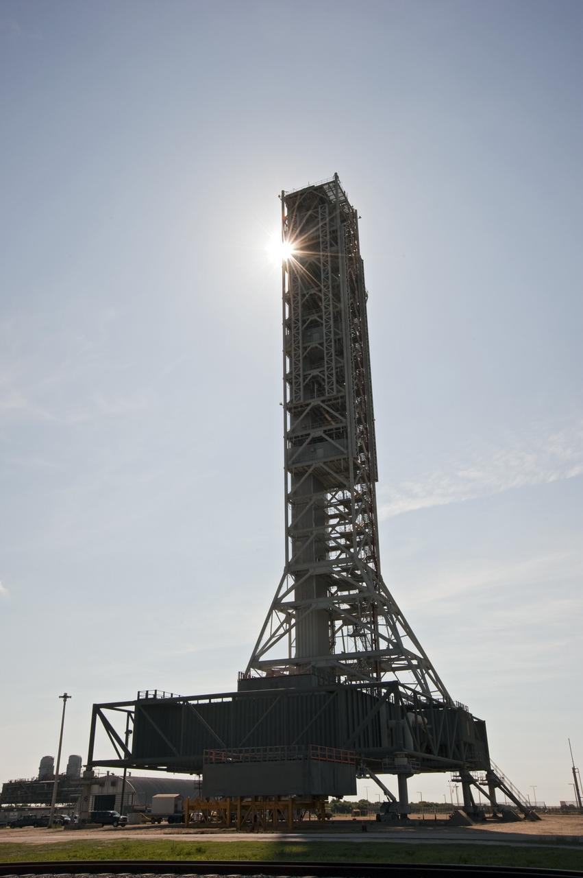CAPE CANAVERAL, Fla. -- NASA's new mobile launcher, or ML, support structure stands tall at NASA's Kennedy Space Center in Florida. It took about two years to construct the launcher in the Mobile Launcher Park site, north of the Vehicle Assembly Building, or VAB. The 355-foot-tall structure will support NASA's future human spaceflight program. The base of the launcher is lighter than space shuttle mobile launcher platforms so the crawler-transporter can pick up the heavier load of the tower and a taller rocket. The next step will be to add ground support equipment, such as umbilicals and access arms, for future rocket launches. For information on NASA's future plans, visit www.nasa.gov. Photo credit: NASA/Kim Shiflett