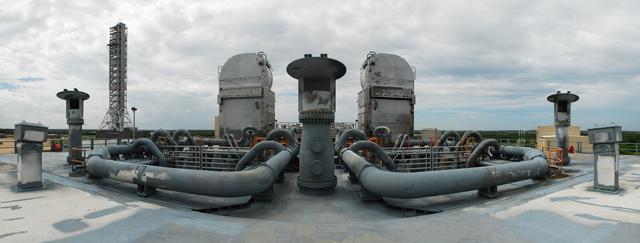CAPE CANAVERAL, Fla. -- This panoramic view of NASA's new mobile launcher, or ML, support structure was taken from the top deck of the space shuttle's mobile launcher platform at NASA's Kennedy Space Center in Florida. It took about two years to construct the new launcher in the Mobile Launcher Park site, north of the Vehicle Assembly Building, or VAB. The 355-foot-tall structure will support NASA's future human spaceflight program. The base of the launcher is lighter than space shuttle mobile launcher platforms so the crawler-transporter can pick up the heavier load of the tower and a taller rocket. The next step will be to add ground support equipment, such as umbilicals and access arms, for future rocket launches. For information on NASA's future plans, visit www.nasa.gov. Photo credit: NASA/Frankie Martin