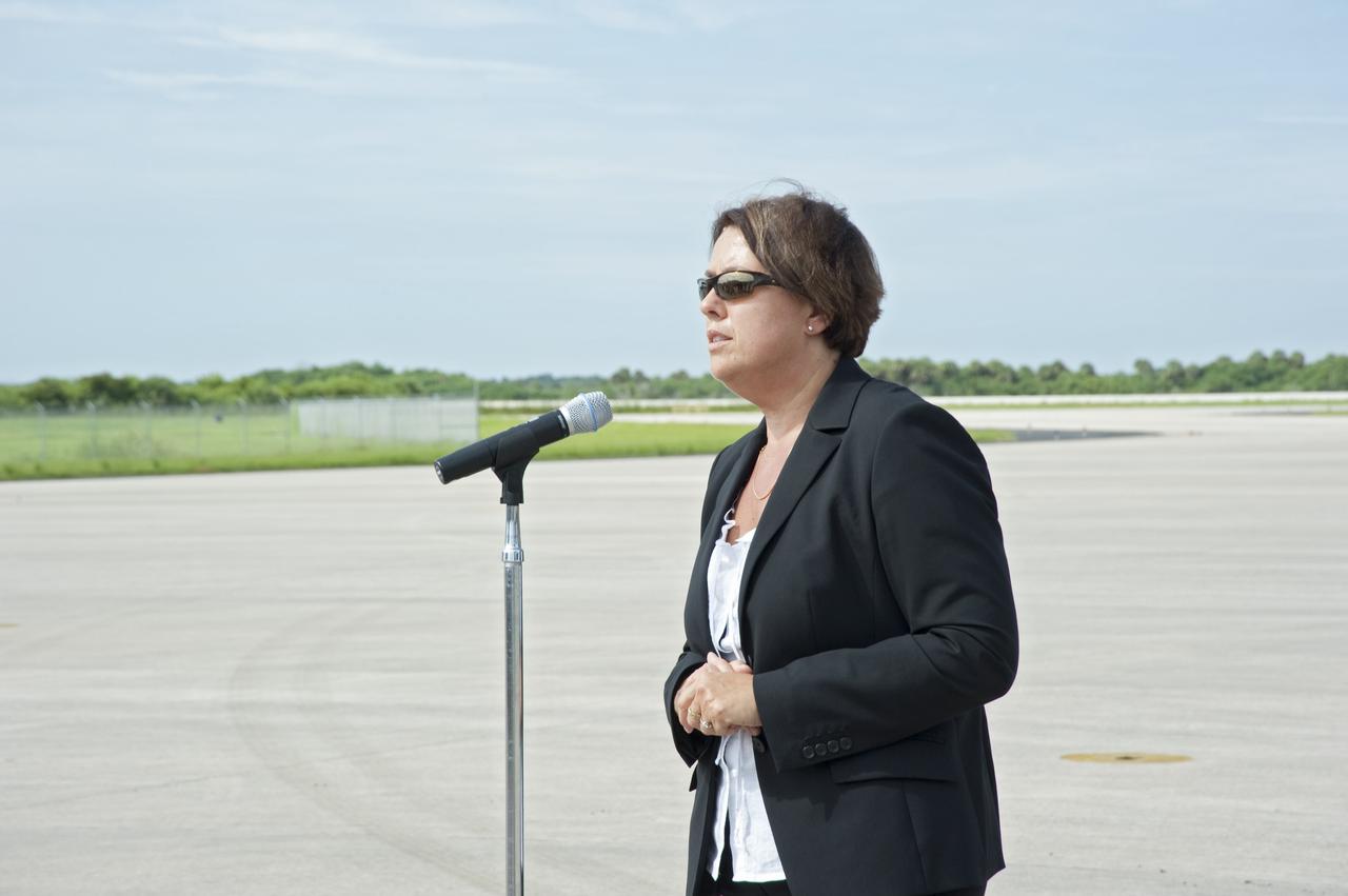 CAPE CANAVERAL, Fla. -- Prior to the arrival of the Alpha Magnetic Spectrometer, or AMS, to the Shuttle Landing Facility at NASA's Kennedy Space Center in Florida, European Space Agency Director of Human Spaceflight, Simonetta Di Pippo addresses the media.      AMS,a state-of-the-art particle physics detector, is designed to operate as an external module on the International Space Station. It will use the unique environment of space to study the universe and its origin by searching for dark matter. AMS will fly to the International Space Station aboard space shuttle Endeavour's STS-134 mission targeted to launch Feb. 26, 2011. Photo credit: NASA/Kim Shiflett