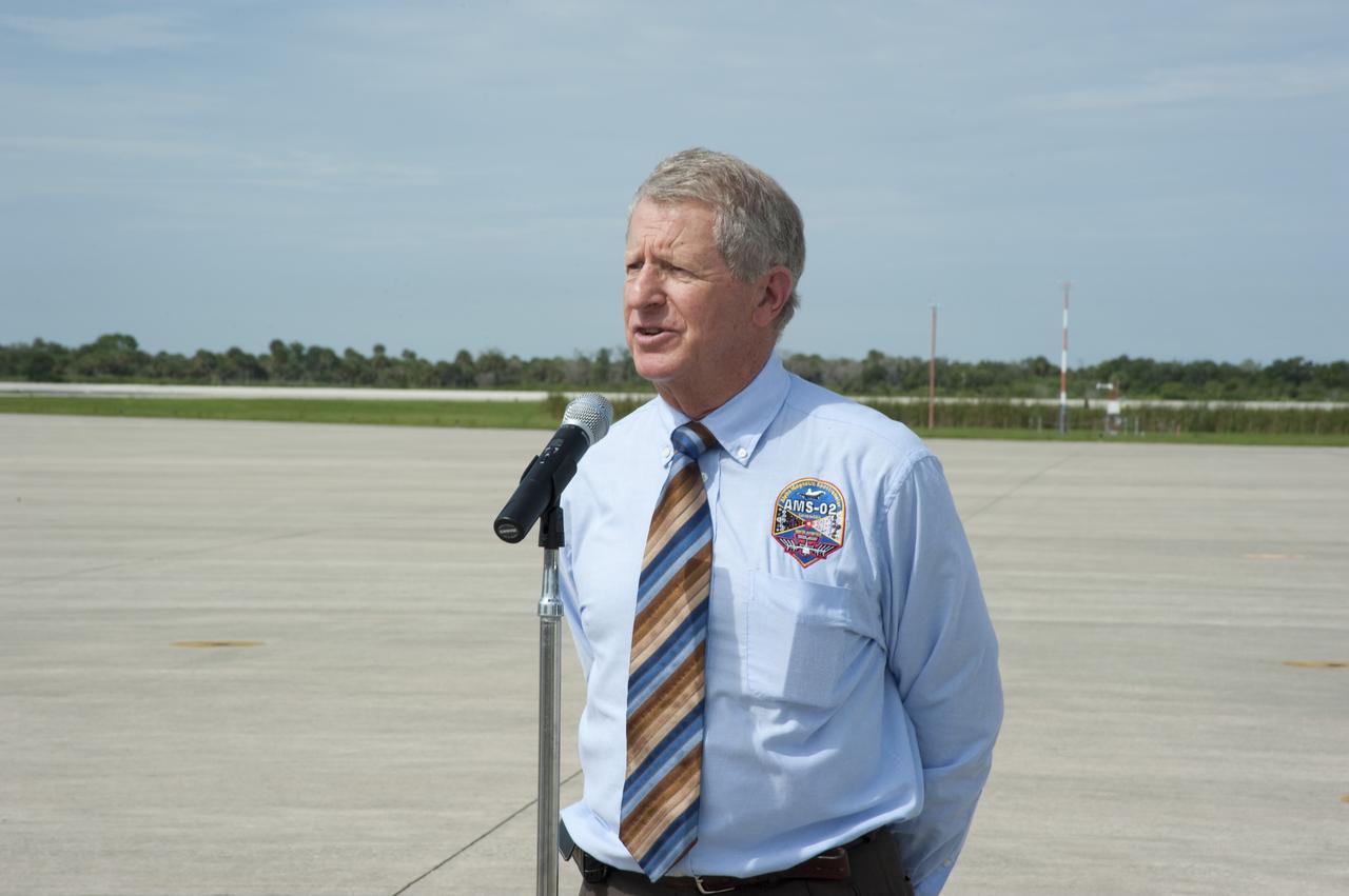 CAPE CANAVERAL, Fla. -- Before the arrival of the Alpha Magnetic Spectrometer, or AMS, to the Shuttle Landing Facility at NASA's Kennedy Space Center in Florida, Professor Maurice Bourquin, AMS Swiss Coordinator, speaks to the media.      AMS, a state-of-the-art particle physics detector, is designed to operate as an external module on the International Space Station. It will use the unique environment of space to study the universe and its origin by searching for dark matter. AMS will fly to the International Space Station aboard space shuttle Endeavour's STS-134 mission targeted to launch Feb. 26, 2011. Photo credit: NASA/Kim Shiflett