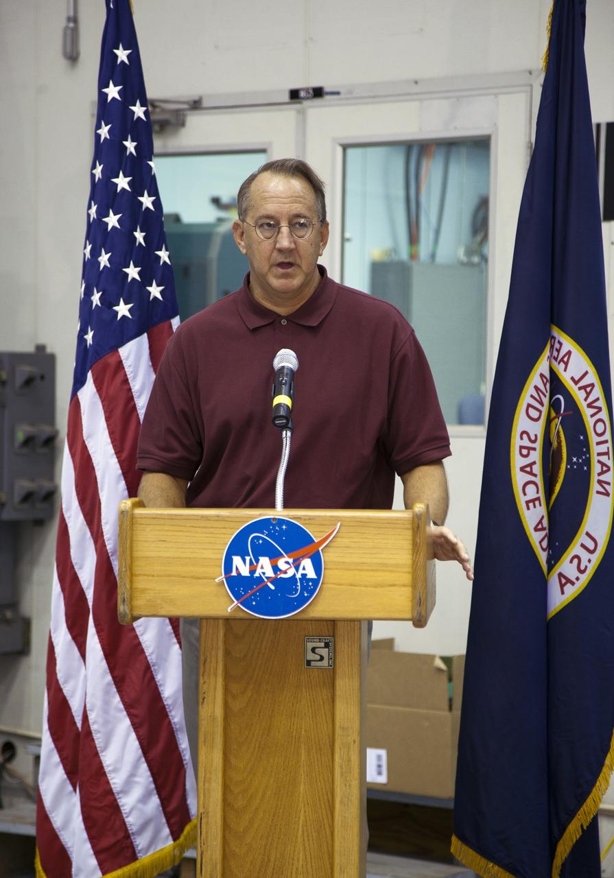 CAPE CANAVERAL, Fla. -- At NASA's Kennedy Space Center in Florida, Director of the center's Engineering Directorate Pat Simpkins talks to workers at the Launch Equipment Test Facility (LETF), which recently underwent a $35 million comprehensive upgrade that lasted four years.           The LETF was established in the 1970s to support the qualification of the Space Shuttle Program’s umbilical and T-0 mechanisms. Throughout the years, it has supported the development of systems for shuttle and the International Space Station, Delta and Atlas rockets, and various research and development programs. The LETF has unique capabilities to evolve into a versatile test and development area that supports a wide spectrum of programs. For information on NASA's future plans, visit www.nasa.gov. Photo credit: NASA/Dimitri Gerondidakis
