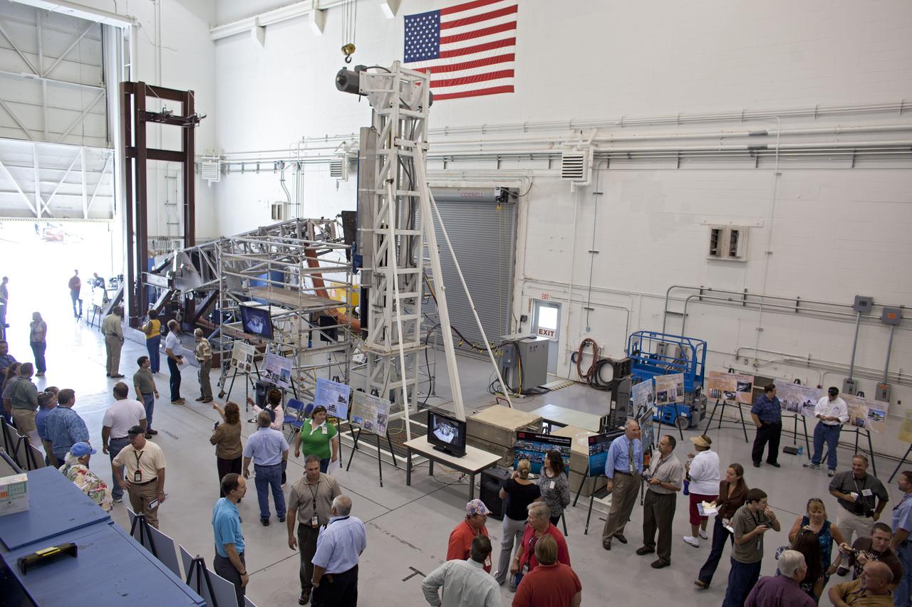 CAPE CANAVERAL, Fla. -- At NASA's Kennedy Space Center in Florida, workers check out the 6,000-square-foot high bay of the Launch Equipment Test Facility (LETF). The LETF recently underwent a $35 million comprehensive upgrade that lasted four years.             The LETF was established in the 1970s to support the qualification of the Space Shuttle Program’s umbilical and T-0 mechanisms. Throughout the years, it has supported the development of systems for shuttle and the International Space Station, Delta and Atlas rockets, and various research and development programs. The LETF has unique capabilities to evolve into a versatile test and development area that supports a wide spectrum of programs. For information on NASA's future plans, visit www.nasa.gov. Photo credit: NASA/Dimitri Gerondidakis