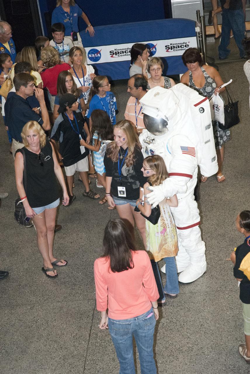 CAPE CANAVERAL, Fla. -- At the Astronaut Hall of Fame near the Kennedy Space Center Visitor Complex in Florida, fifth- through eighth-grade students and their parents meet a space person during the last NASA family education night event. Other activities included "gee-whiz" presentations, astronaut appearances, a hovercraft, vortex cannon and alternative fuel vehicles, which promote science, technology, engineering and mathematics (STEM) education.    The event is part of NASA's Summer of Innovation initiative to provide interactive learning experiences to middle school students nationwide during the summer months. The program is a cornerstone of the Educate to Innovate campaign announced by President Barack Obama in November 2009. Photo credit: NASA/Charisse Nahser