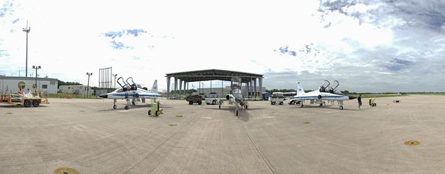 CAPE CANAVERAL, Fla. -- At NASA's Kennedy Space Center in Florida, three of NASA's T-38 training jets sit on the parking apron of the Shuttle Landing Facility. The STS-134 crew members flew the jets to Kennedy to watch the Alpha Magnetic Spectrometer (AMS) arrive aboard an Air Force C-5M aircraft from Europe. The state-of-the-art particle physics detector will operate as an external module on the International Space Station to study the universe and its origin by searching for dark matter.      AMS will fly to the station aboard space shuttle Endeavour's STS-134 mission targeted to launch Feb. 26, 2011.  Photo credit: NASA/Frankie Martin