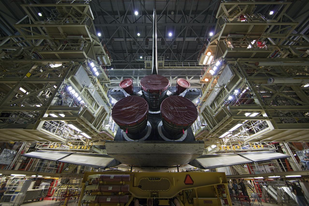CAPE CANAVERAL, Fla. -- At NASA's Kennedy Space Center in Florida, shuttle Discovery begins to back out of Orbiter Processing Facility-3 during a move called "rollover" to the nearby Vehicle Assembly Building (VAB). Once inside the VAB, the shuttle will be joined to its solid rocket boosters and external fuel tank. Later this month, Discovery is scheduled to "rollout" to Launch Pad 39A for its launch to the International Space Station on the STS-133 mission. Targeted to liftoff Nov. 1, Discovery will take the Permanent Multipurpose Module (PMM) packed with supplies and critical spare parts, as well as Robonaut 2 (R2) to the station. Photo credit: NASA/Dimitri Gerondidakis