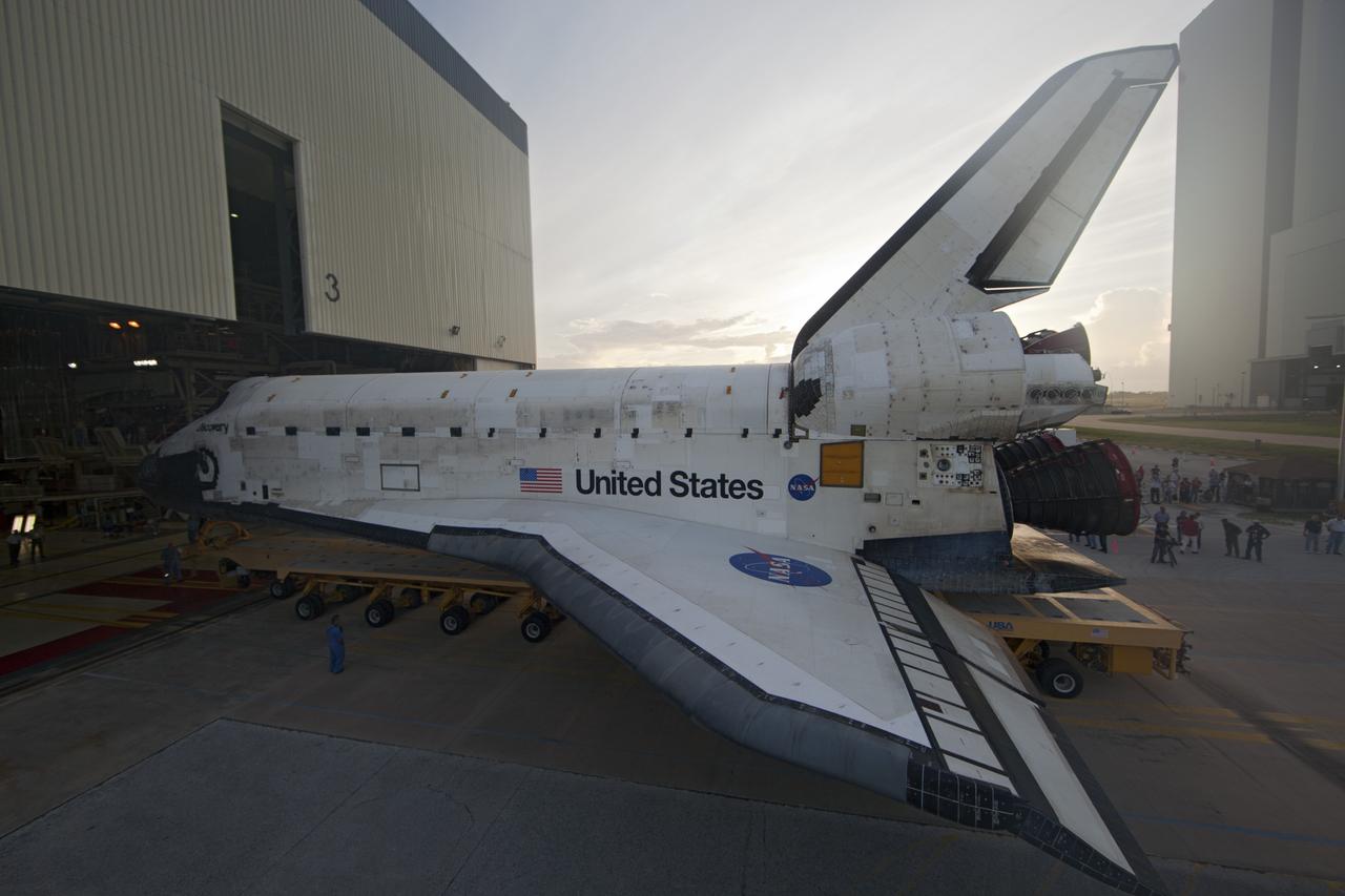CAPE CANAVERAL, Fla. -- At NASA's Kennedy Space Center in Florida, shuttle Discovery backs out of Orbiter Processing Facility-3 during a move called "rollover" to the nearby Vehicle Assembly Building (VAB). Once inside the VAB, the shuttle will be joined to its solid rocket boosters and external fuel tank. Later this month, Discovery is scheduled to "rollout" to Launch Pad 39A for its launch to the International Space Station on the STS-133 mission. Targeted to liftoff Nov. 1, Discovery will take the Permanent Multipurpose Module (PMM) packed with supplies and critical spare parts, as well as Robonaut 2 (R2) to the station. Photo credit: NASA/Dimitri Gerondidakis