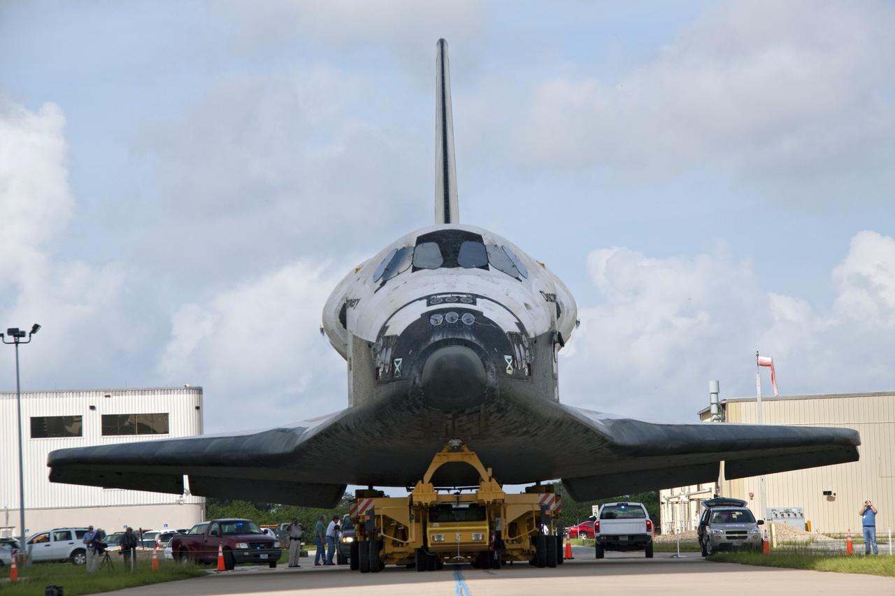 CAPE CANAVERAL, Fla. -- At NASA's Kennedy Space Center in Florida, shuttle Discovery is ready to continue its move, known as "rollover," from Orbiter Processing Facility-3 to the nearby Vehicle Assembly Building (VAB). Once inside the VAB, the shuttle will be joined to its solid rocket boosters and external fuel tank. Later this month, Discovery is scheduled to "rollout" to Launch Pad 39A for its launch to the International Space Station on the STS-133 mission. Targeted to liftoff Nov. 1, Discovery will take the Permanent Multipurpose Module (PMM) packed with supplies and critical spare parts, as well as Robonaut 2 (R2) to the station. Photo credit: NASA/Jack Pfaller