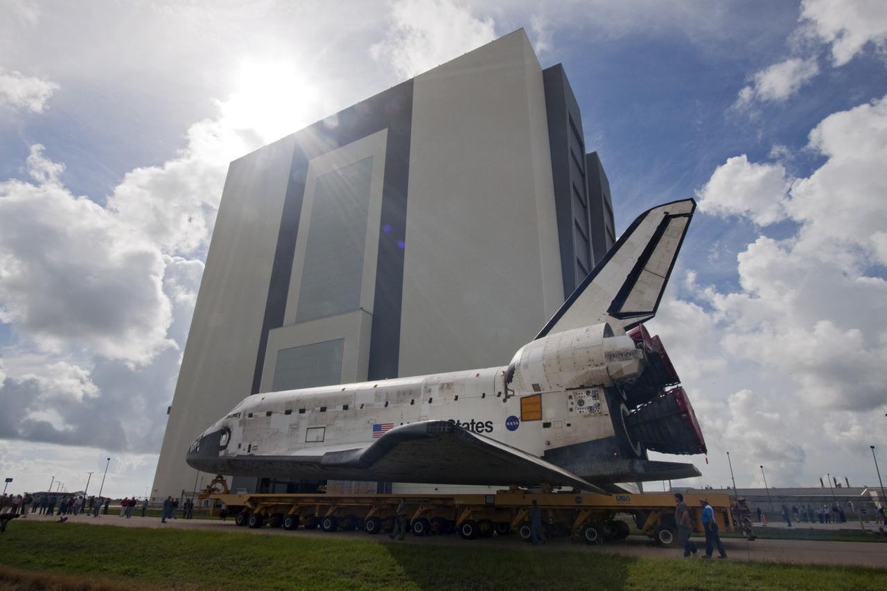 CAPE CANAVERAL, Fla. -- At NASA's Kennedy Space Center in Florida, shuttle Discovery continues its move, known as "rollover," from Orbiter Processing Facility-3 to the nearby Vehicle Assembly Building (VAB). Once inside the VAB, the shuttle will be joined to its solid rocket boosters and external fuel tank. Later this month, Discovery is scheduled to "rollout" to Launch Pad 39A for its launch to the International Space Station on the STS-133 mission. Targeted to liftoff Nov. 1, Discovery will take the Permanent Multipurpose Module (PMM) packed with supplies and critical spare parts, as well as Robonaut 2 (R2) to the station. Photo credit: NASA/Jack Pfaller