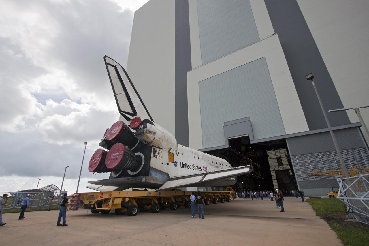 CAPE CANAVERAL, Fla. -- At NASA's Kennedy Space Center in Florida, shuttle Discovery is ushered into the Vehicle Assembly Building (VAB) from Orbiter Processing Facility-3 during a move known as "rollover." Once inside the VAB, the shuttle will be joined to its solid rocket boosters and external fuel tank. Later this month, Discovery is scheduled to "rollout" to Launch Pad 39A for its launch to the International Space Station on the STS-133 mission. Targeted to liftoff Nov. 1, Discovery will take the Permanent Multipurpose Module (PMM) packed with supplies and critical spare parts, as well as Robonaut 2 (R2) to the station. Photo credit: NASA/Jack Pfaller