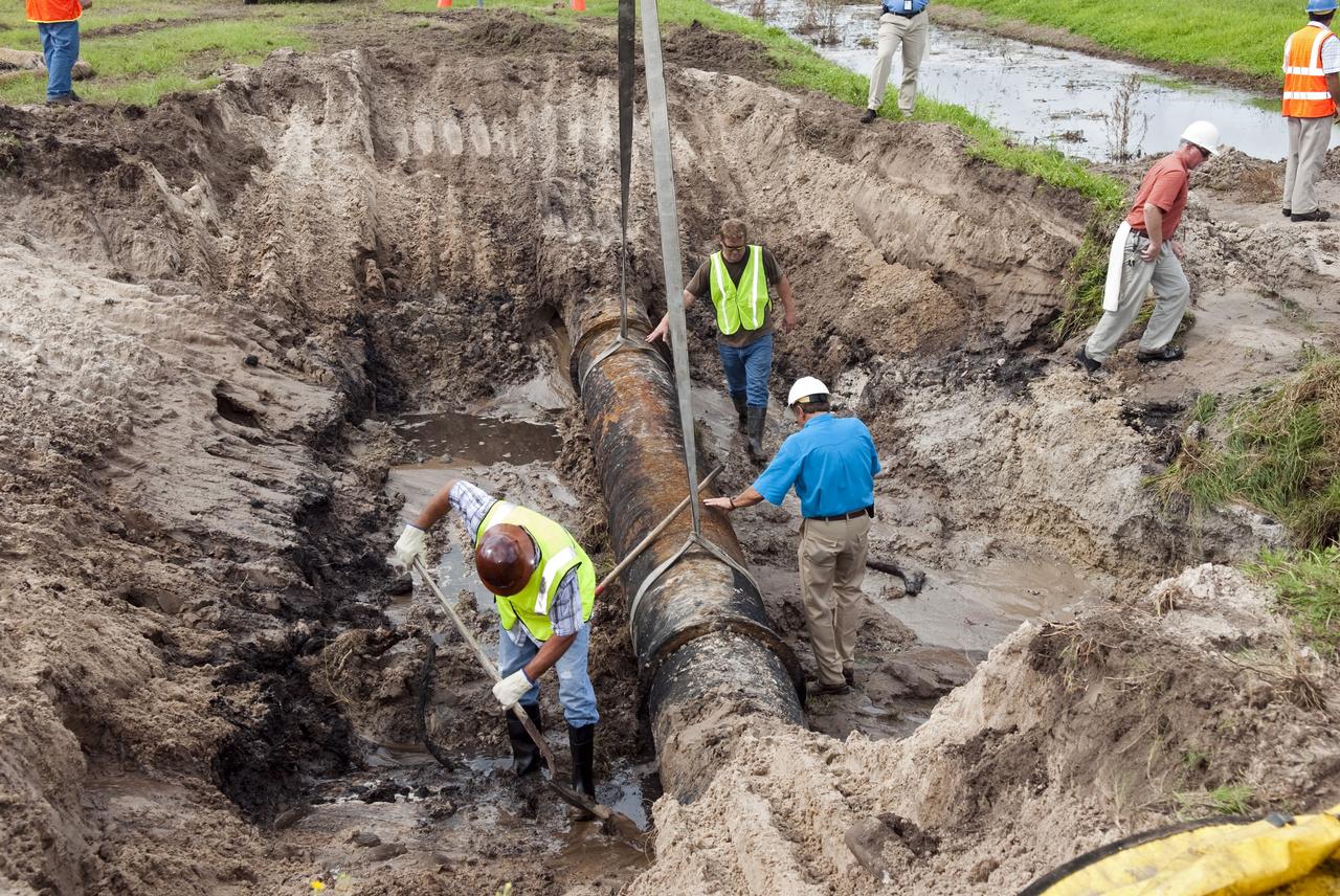 CAPE CANAVERAL, Fla. -- At NASA's Kennedy Space Center in Florida, a crew begins to fix a major water main break in a 24-inch cast iron pipe in the Launch Complex-39 Turn Basin area, across from the Vehicle Assembly Building and the Launch Control Center. Kennedy was closed to non-essential personnel the morning of Sept. 8 while crews assessed the break and restored water to the center. Photo credit: NASA/Jim Grossmann