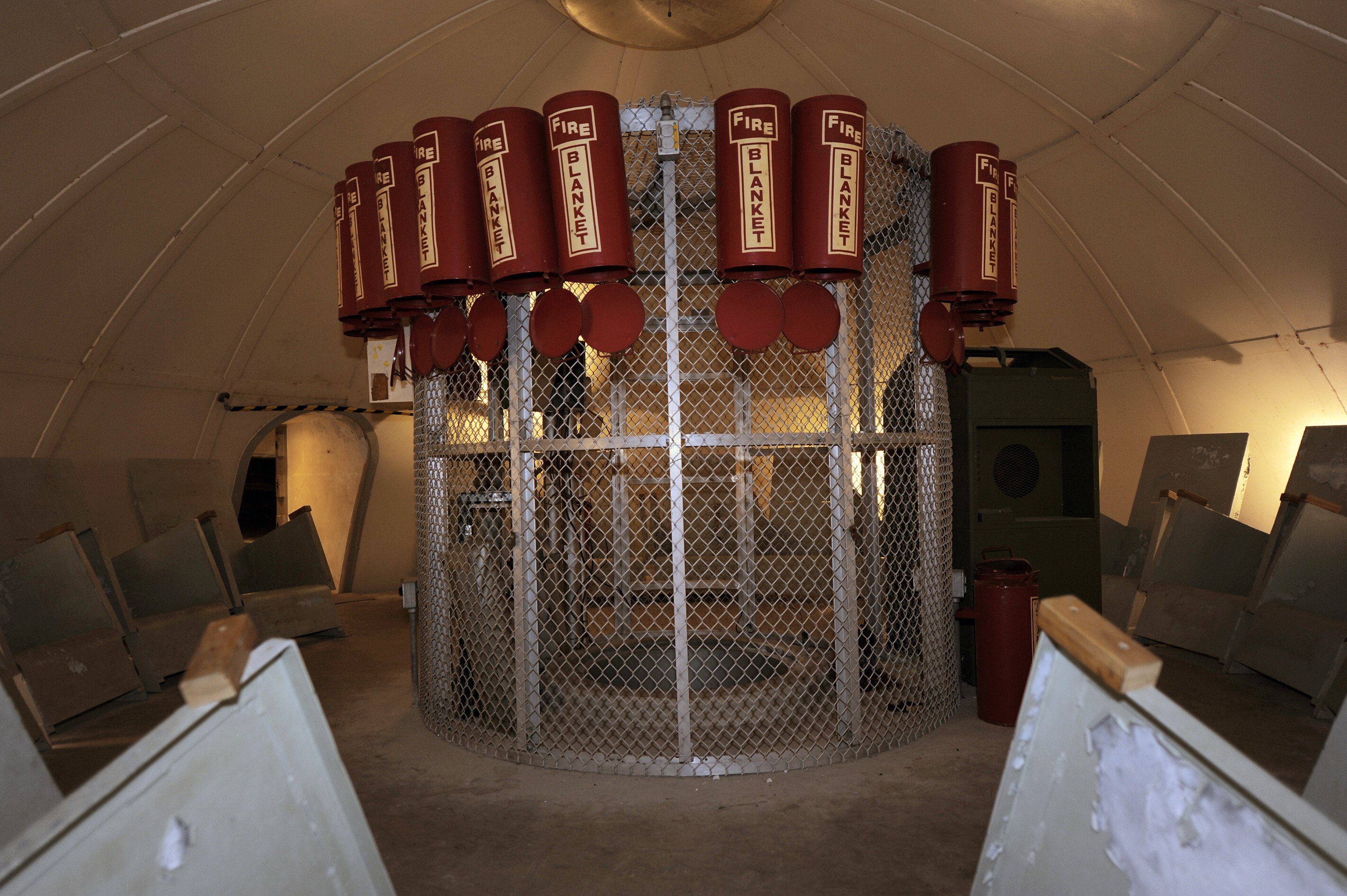 CAPE CANAVERAL, Fla. -- Empty fire blanket holders are at the center of the blast-resistant "rubber room" beneath Launch Pad 39B at NASA's Kennedy Space Center in Florida. The room is a steel dome floating on rubber isolators and was used as an escape route during the Apollo Program in case of an emergency. It has since been abandoned by astronauts, but throughout the years nature found its way inside, including raccoons, snakes, birds and even a bobcat and opossum.    Starting in 2009, the structure above the room on the pad was no longer needed for NASA's Space Shuttle Program, so it is being restructured for future use. The new design will feature a "clean pad" for rockets to come with their own launcher, making it more versatile for a number of vehicles. For information on NASA's future plans, visit www.nasa.gov. Photo credit: NASA/Kim Shiflett