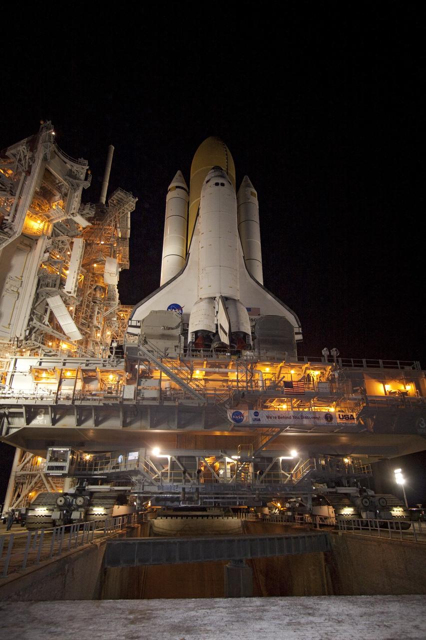 CAPE CANAVERAL, Fla. -- At NASA's Kennedy Space Center in Florida, space shuttle Discovery makes the last leg of its journey, known as "rollout," from the Vehicle Assembly Building to Launch Pad 39A. It took the shuttle, attached to its external fuel tank, twin solid rocket boosters and mobile launcher platform, about six hours to complete the move atop a crawler-transporter. Rollout sets the stage for Discovery's STS-133 crew to practice countdown and launch procedures during the Terminal Countdown Demonstration Test in mid-October. Targeted to liftoff Nov. 1, Discovery will take the Permanent Multipurpose Module (PMM) packed with supplies and critical spare parts, as well as Robonaut 2 (R2) to the International Space Station. Photo credit: NASA/Jack Pfaller