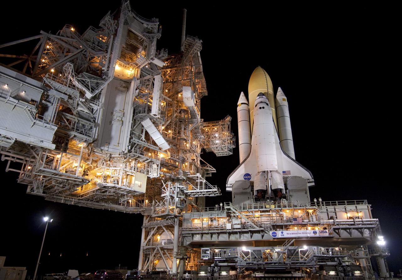 CAPE CANAVERAL, Fla. -- At NASA's Kennedy Space Center in Florida, space shuttle Discovery is attached to Launch Pad 39A, completing "rollout" from the Vehicle Assembly Building to Launch Pad 39A. It took the shuttle, attached to its external fuel tank, twin solid rocket boosters and mobile launcher platform, about six hours to complete the move atop a crawler-transporter. Rollout sets the stage for Discovery's STS-133 crew to practice countdown and launch procedures during the Terminal Countdown Demonstration Test in mid-October. Targeted to liftoff Nov. 1, Discovery will take the Permanent Multipurpose Module (PMM) packed with supplies and critical spare parts, as well as Robonaut 2 (R2) to the International Space Station. Photo credit: NASA/Jack Pfaller