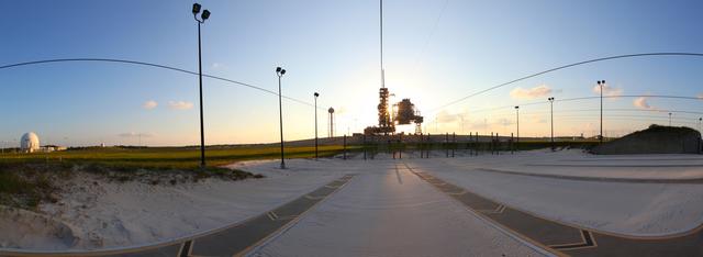 CAPE CANAVERAL, Fla. -- Space shuttle Discovery is attached to Launch Pad 39A as the sun rises over NASA's Kennedy Space Center in Florida. Later, the rotating service structure that protects the shuttle from the elements and provides access inside the vehicle will be moved into place. It took the spacecraft about six hours to make the journey, known as "rollout," from the Vehicle Assembly Building to the pad. Rollout sets the stage for Discovery's STS-133 crew to practice countdown and launch procedures during the Terminal Countdown Demonstration Test in mid-October. Targeted to liftoff Nov. 1, Discovery will take the Permanent Multipurpose Module (PMM) packed with supplies and critical spare parts, as well as Robonaut 2 (R2) to the International Space Station. Photo credit: NASA/Frankie Martin