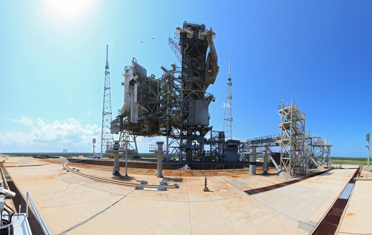 CAPE CANAVERAL, Fla. -- At NASA's Kennedy Space Center in Florida, this panoramic image shows Launch Pad 39B during deconstruction. Starting in 2009, the structure at Pad B was no longer needed for NASA's Space Shuttle Program, so it is being restructured for future use. The new design will feature a "clean pad" for rockets to come with their own launcher, making it more versatile for a number of vehicles. For information on NASA's future plans, visit www.nasa.gov. Photo credit: NASA/Frankie Martin