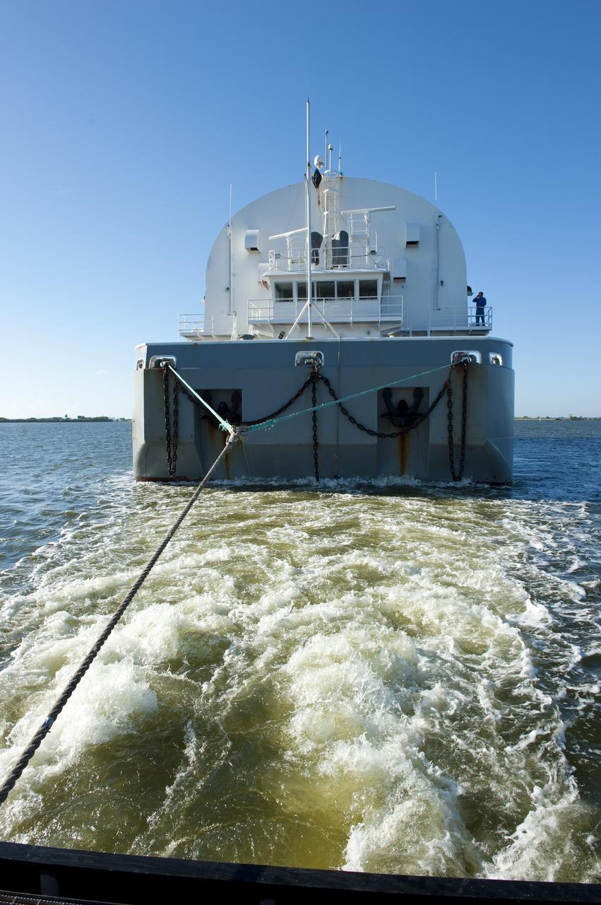 CAPE CANAVERAL, Fla. -- NASA's Pegasus barge, carrying the Space Shuttle Program's last external fuel tank, ET-122, nears NASA's Kennedy Space Center in Florida. The tank traveled 900 miles by sea from NASA's Michoud Assembly Facility in New Orleans. After reaching the Turn Basin at Kennedy, the tank will be offloaded and moved to the Vehicle Assembly Building where it eventually will be attached to space shuttle Endeavour for the STS-134 mission to the International Space Station. STS-134, targeted to launch in Feb. 2011, currently is scheduled to be the last mission in the Space Shuttle Program.         The tank, which is the largest element of the space shuttle stack, was damaged during Hurricane Katrina in August 2005 and restored to flight configuration by Lockheed Martin Space Systems Company employees. Photo credit: NASA/Kim Shiflett